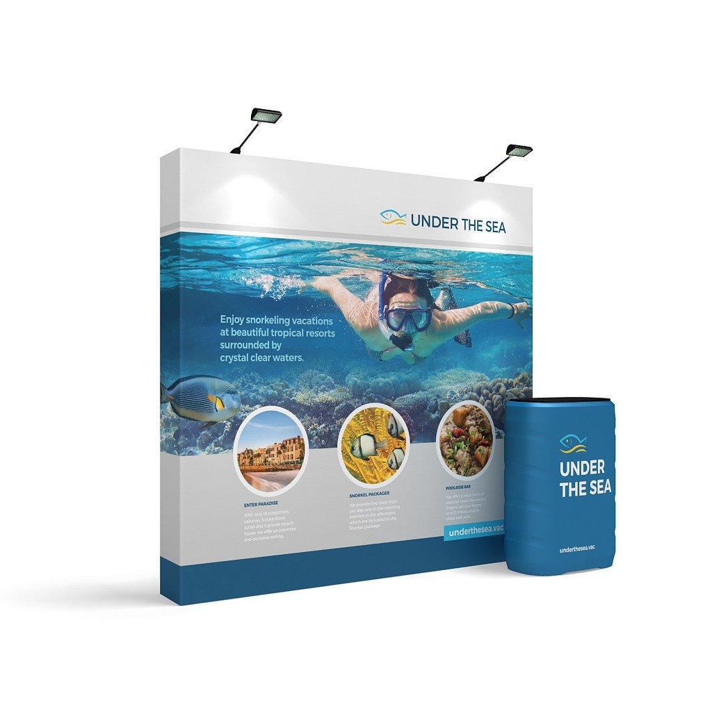 Exhibition display booth with underwater snorkeling theme and branded cylindrical counter for trade shows