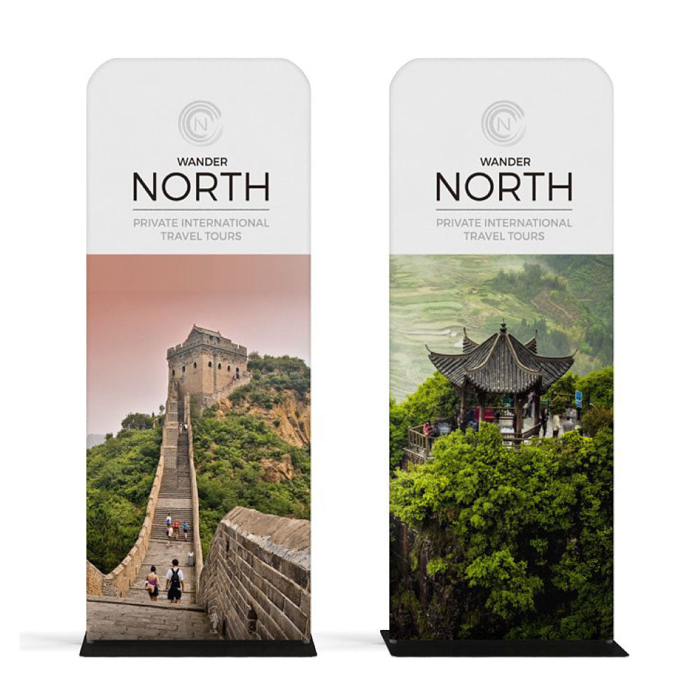 Trade show banner stands featuring travel tour images of historic landmarks and scenic nature for exhibitions