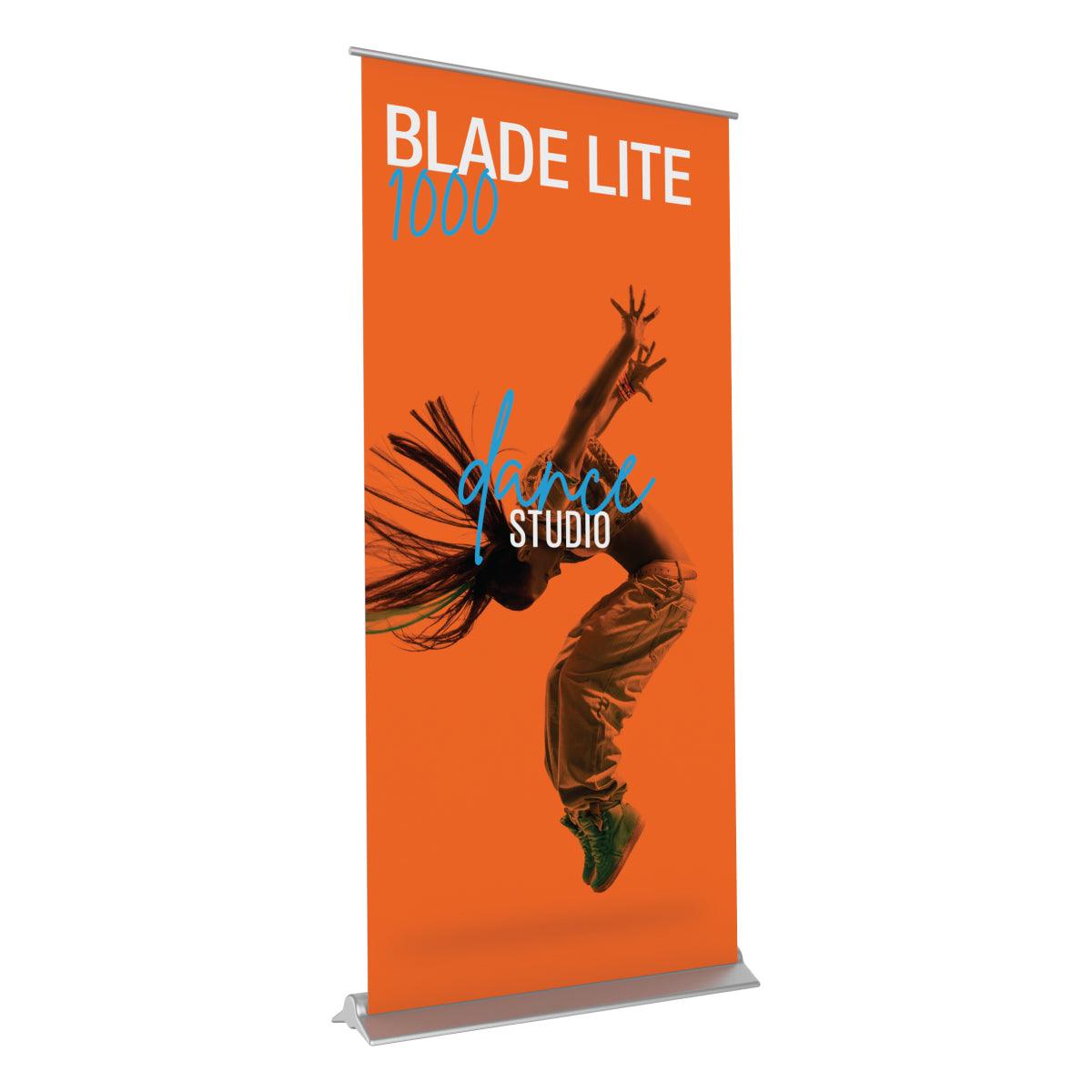Retractable trade show banner stand featuring dynamic dance studio graphic for exhibitions and events