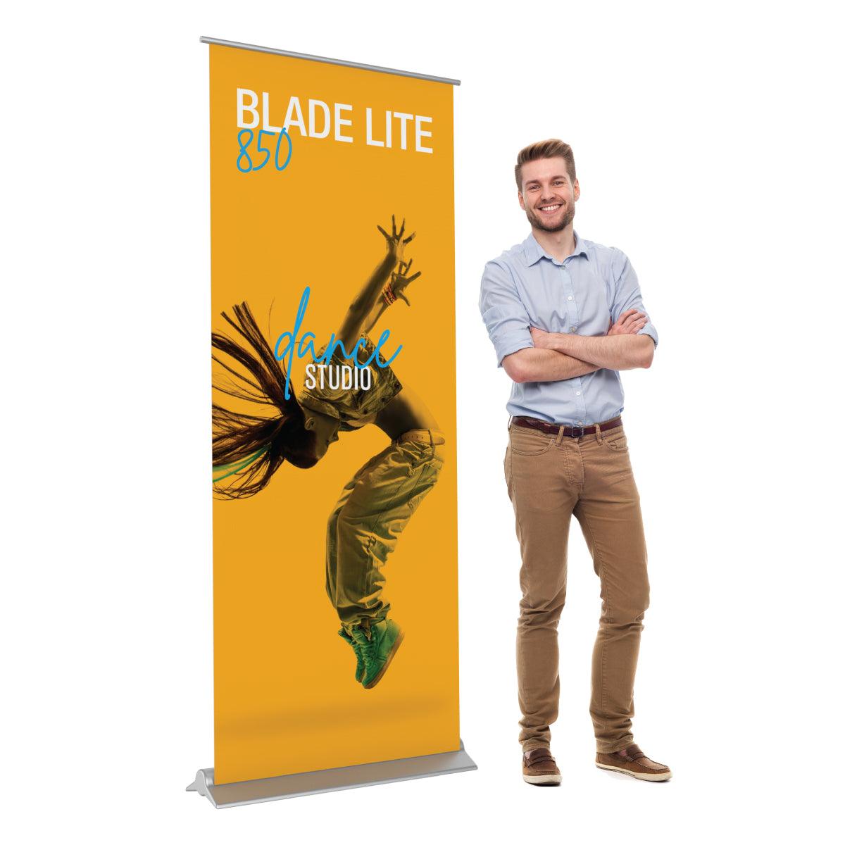 Retractable banner stand featuring dynamic dance studio advertisement for trade shows and exhibitions