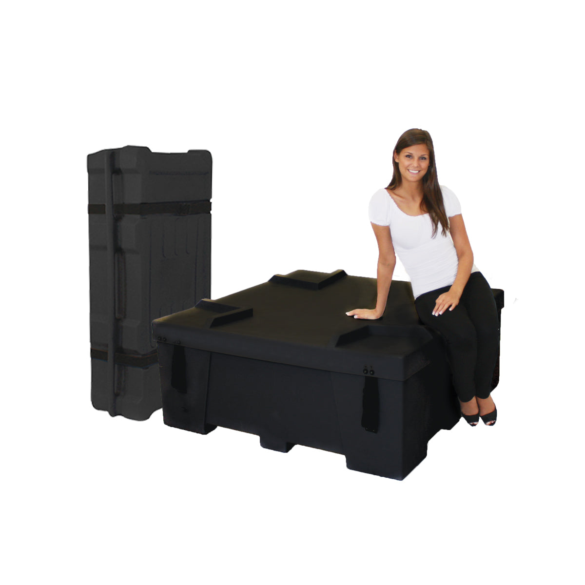 Large durable transport cases ideal for trade shows and exhibitions with a woman sitting on one