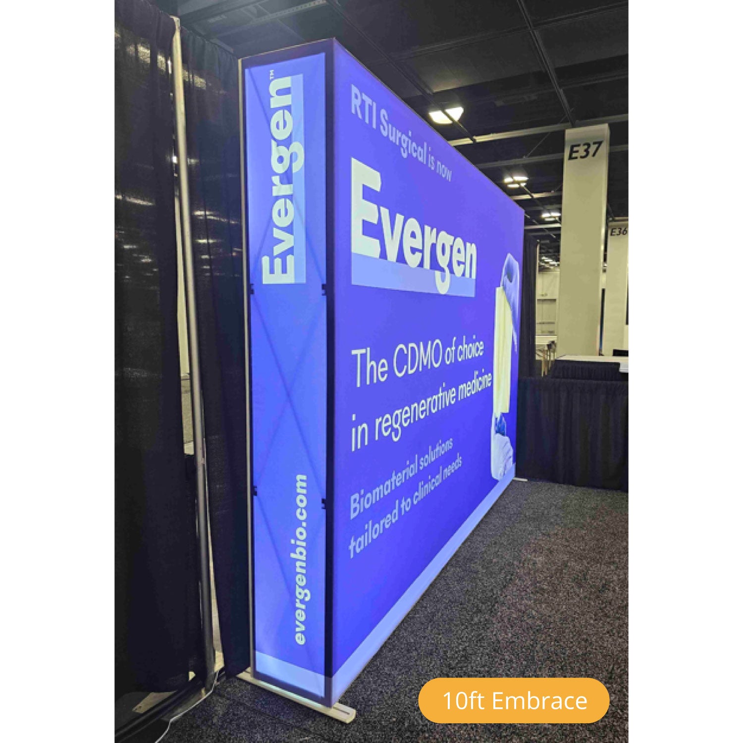 10ft Embrace trade show display featuring promotional graphics for regenerative medicine CDMO services