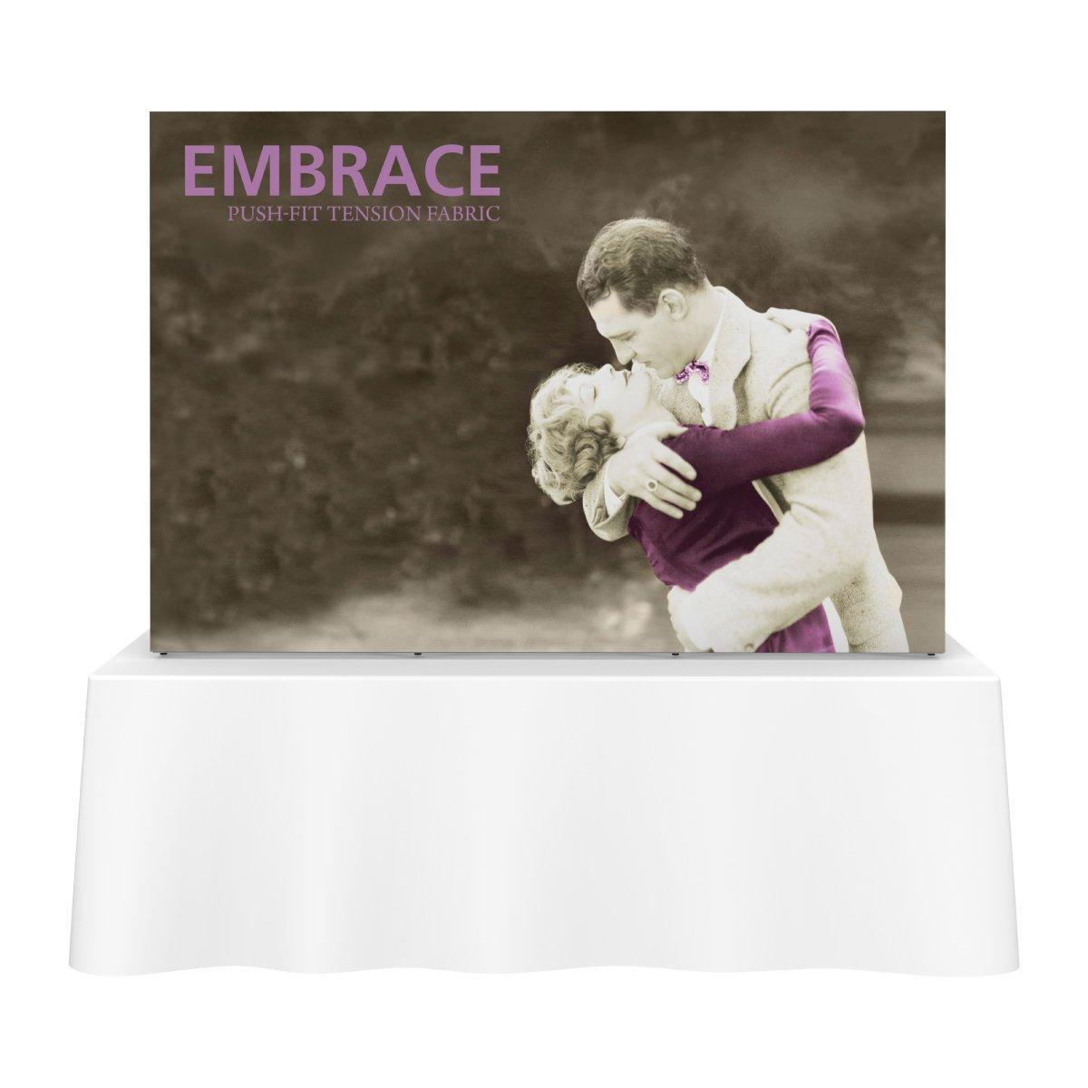 Trade show tabletop display with push-fit tension fabric graphic featuring a vintage embracing couple