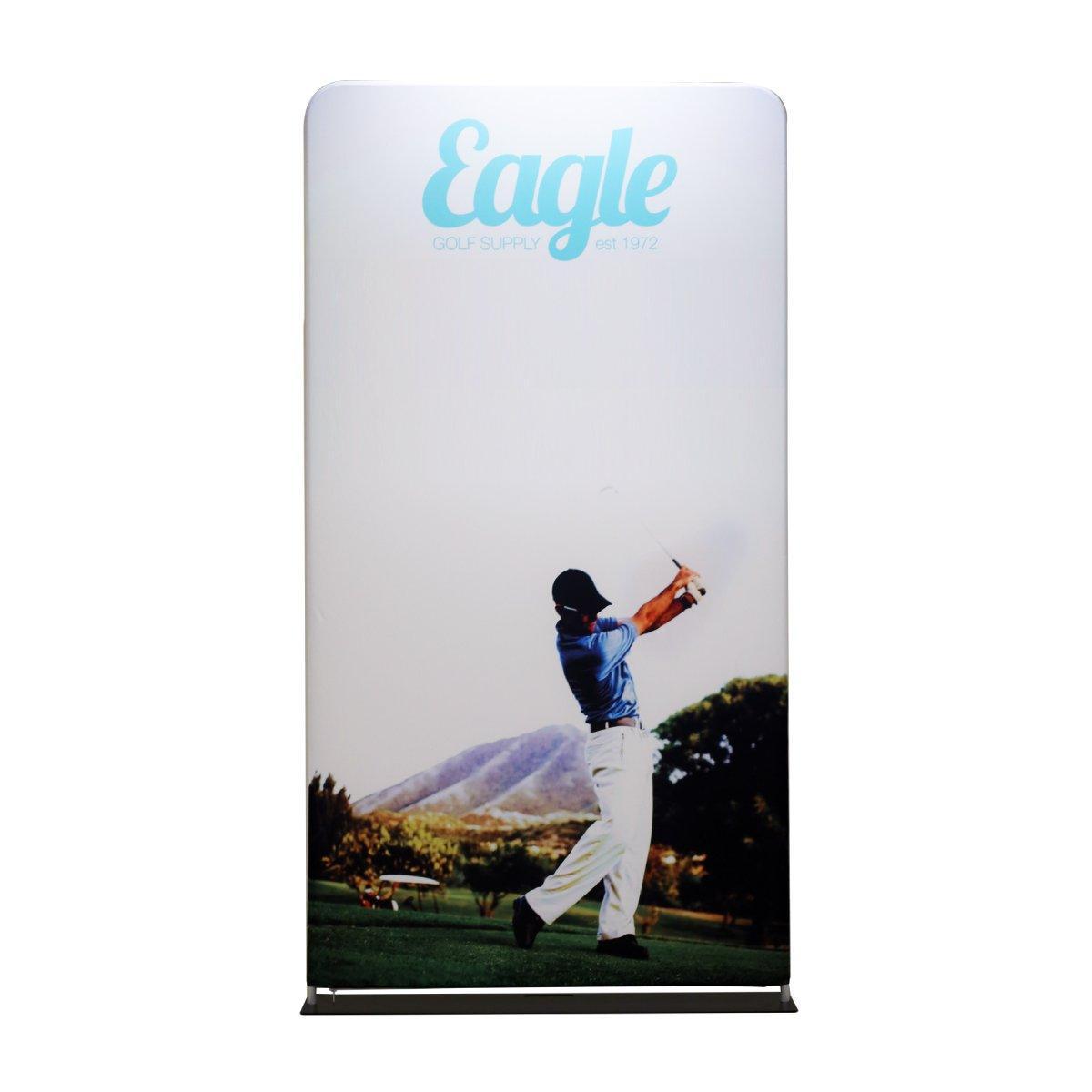 Fabric display featuring golfer swinging club in outdoor scenic setting for trade show or exhibition