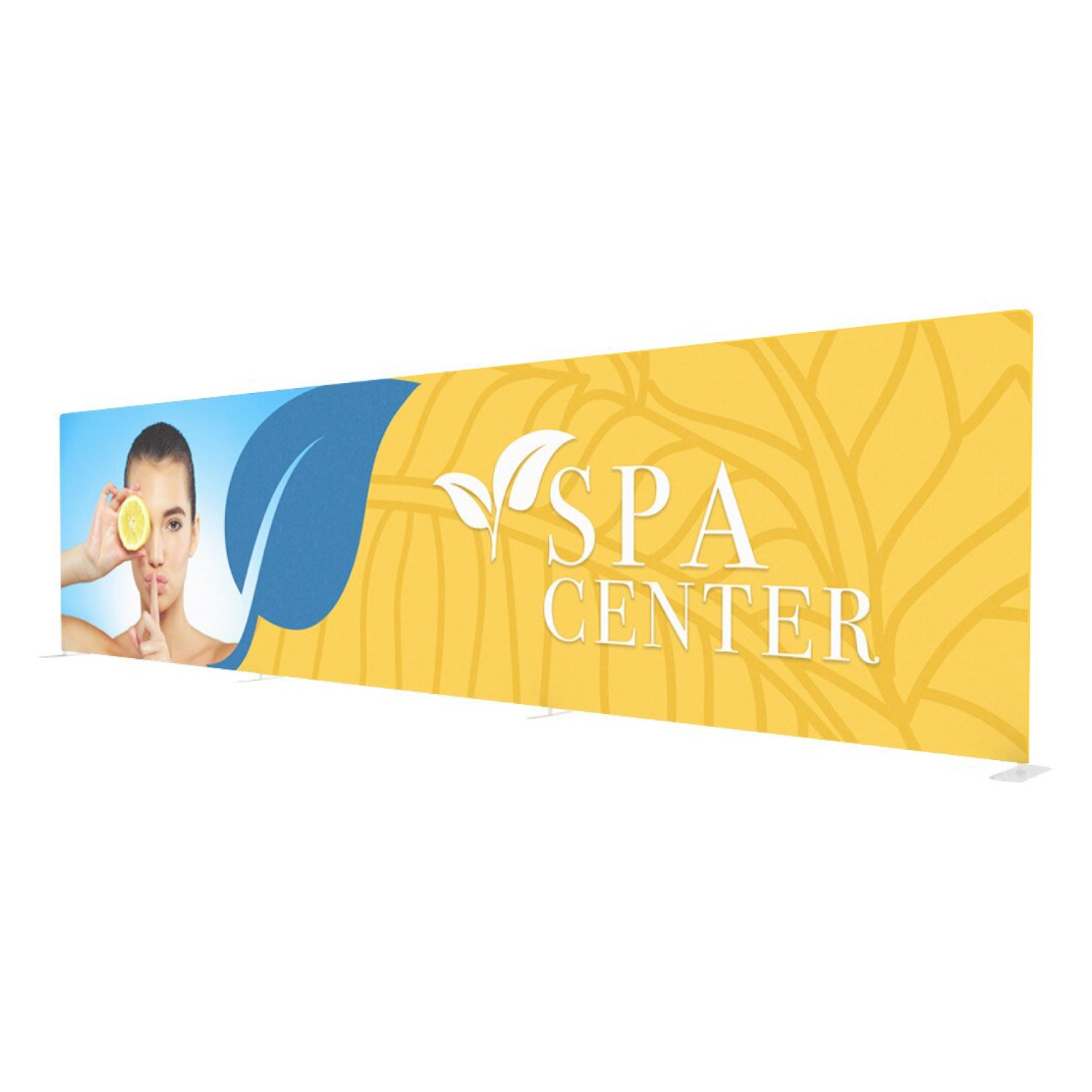 Large fabric trade show display featuring spa center branding and a woman holding lemon for wellness exhibit