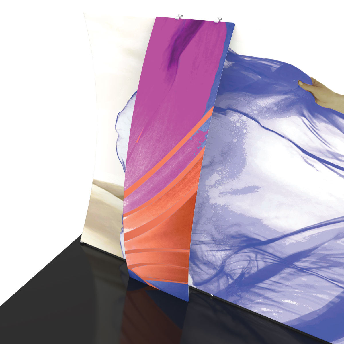 Trade show backwall fabric graphics being installed and adjusted for exhibitions and special events