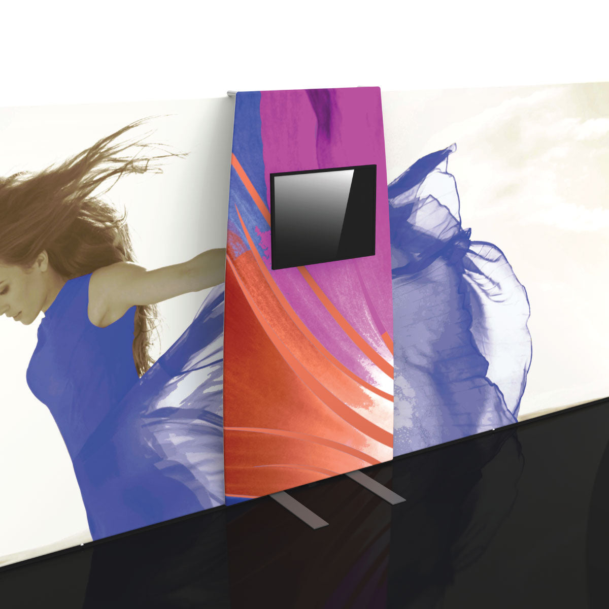 Modular trade show backwall display with vibrant graphics and integrated monitor for exhibitions