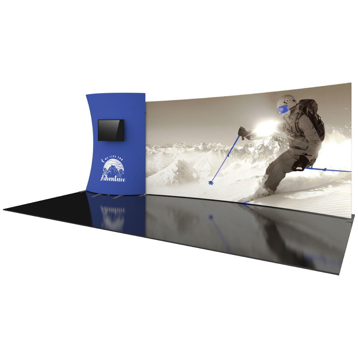 Trade show display booth with curved standing graphic and large backdrop featuring skier in mountain landscape