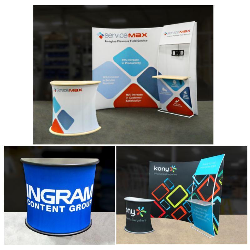 Trade show display stands and counters with branded graphics for exhibitions and special events