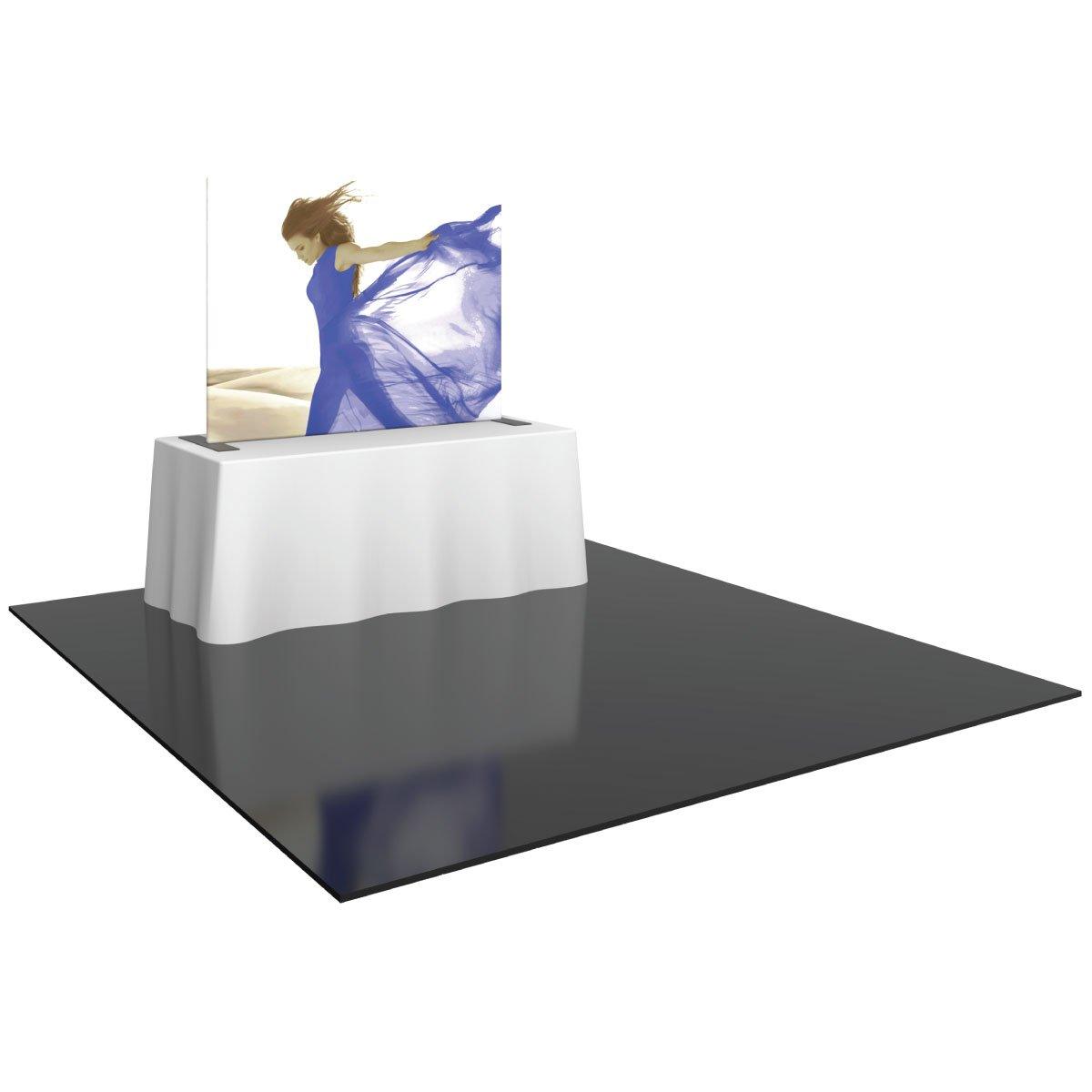 Tabletop trade show display with fabric graphic and white table cover on glossy floor