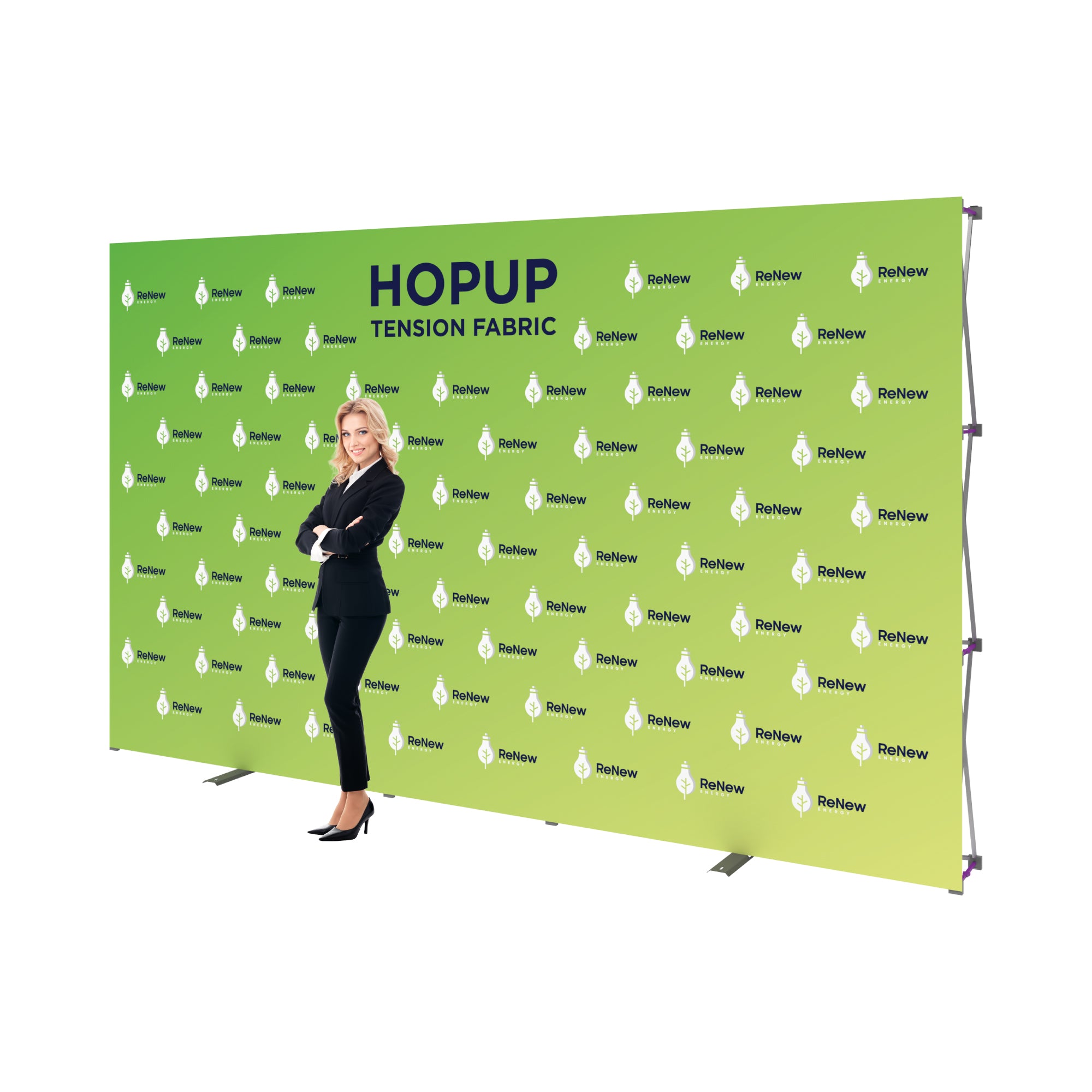 Businesswoman standing next to large tension fabric backdrop with branded graphics for trade shows