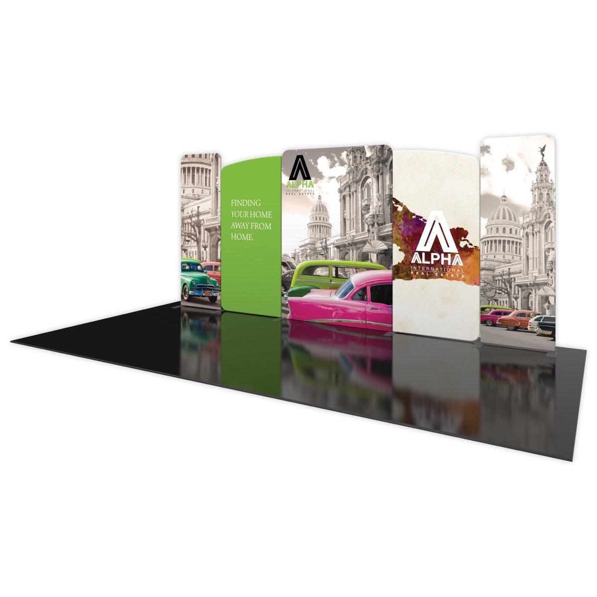 Trade show display kit with curved fabric panel walls featuring vintage cityscape and real estate branding