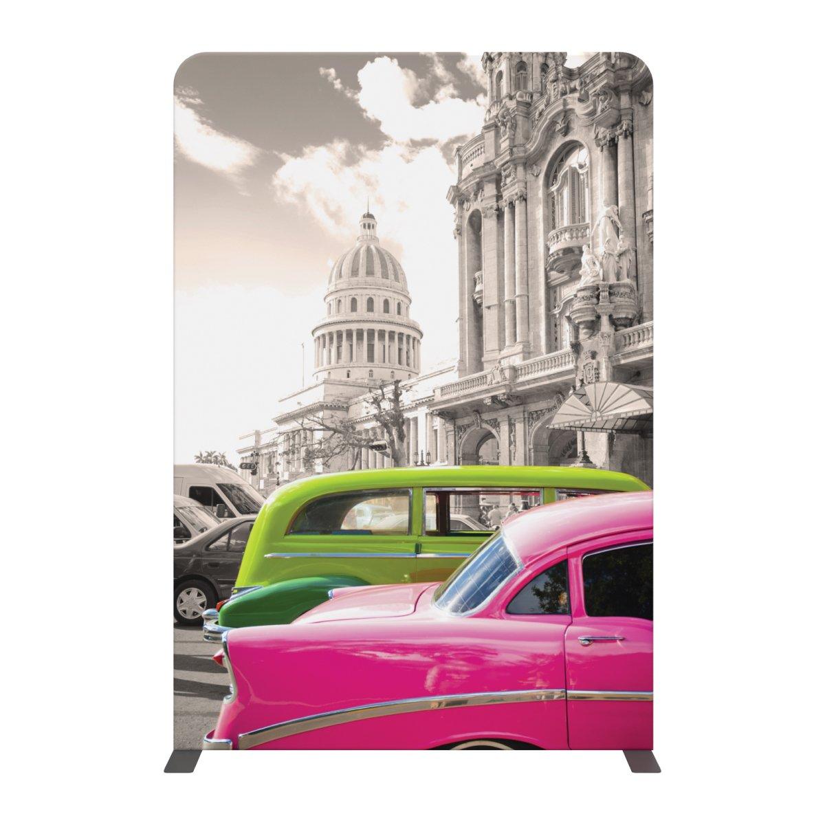 Trade show display featuring vintage cars and historic architecture backdrop for exhibitions