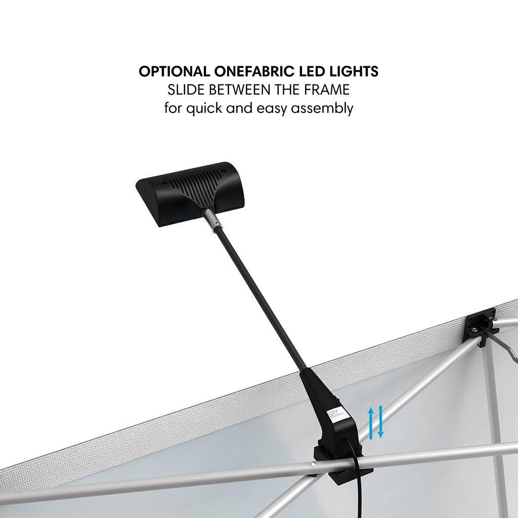 Adjustable LED light clip designed for quick assembly on trade show and exhibition fabric display frames
