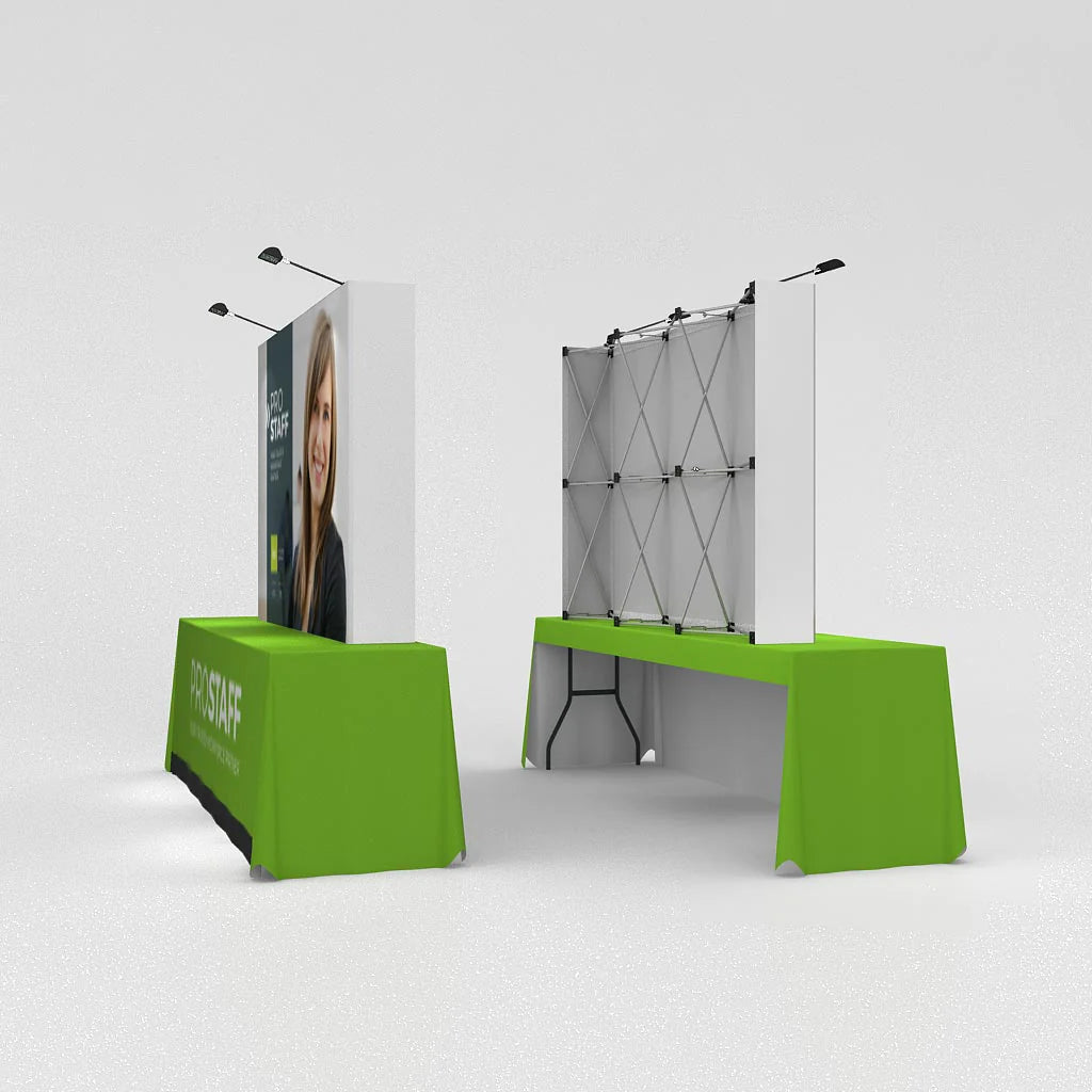 Pop-up fabric display on folding table for trade shows and exhibitions with overhead spotlights