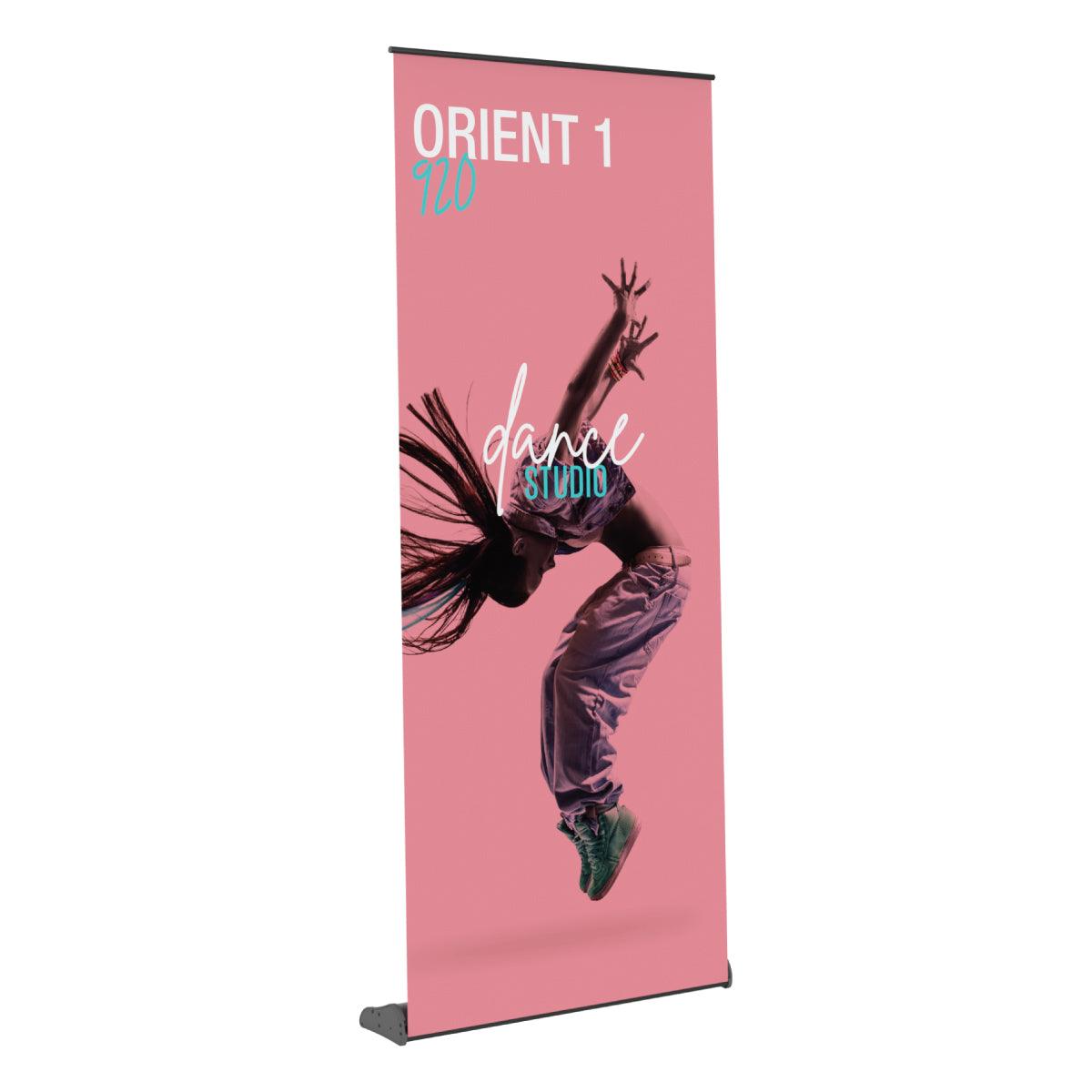 Retractable banner stand featuring dynamic dance studio advertisement for trade show and exhibition displays