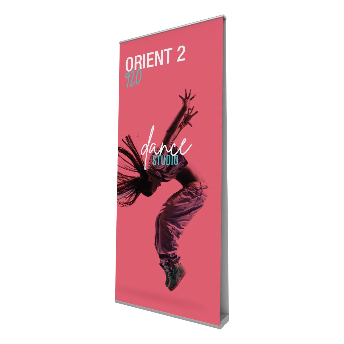 Double-sided banner stand displaying a dance studio advertisement, ideal for trade shows and exhibitions