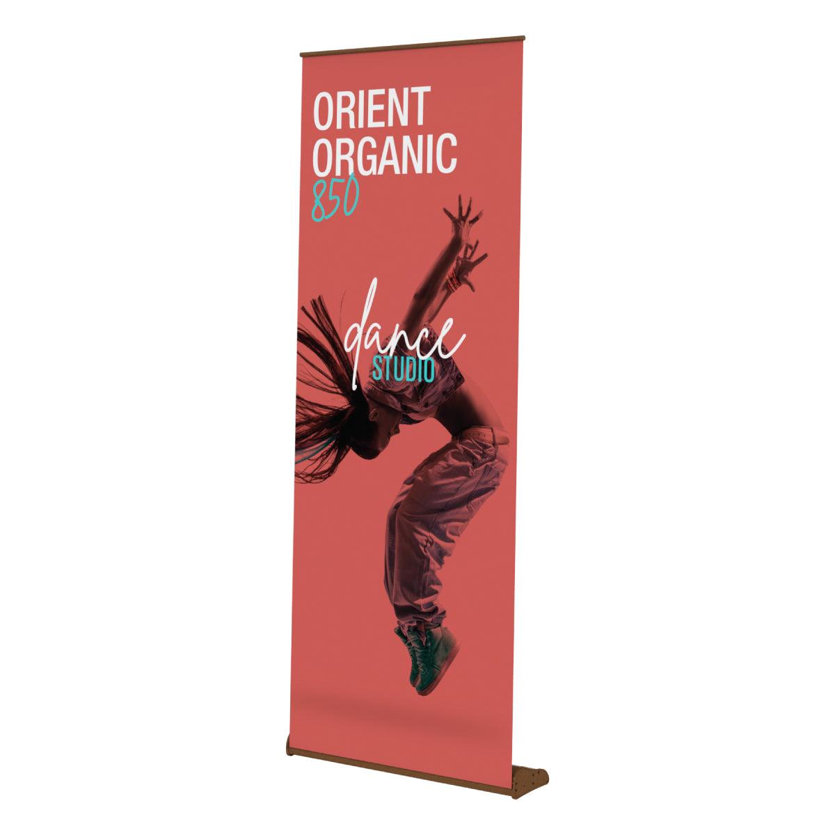 Retractable banner stand displaying dynamic dance studio advertisement for trade shows and exhibitions