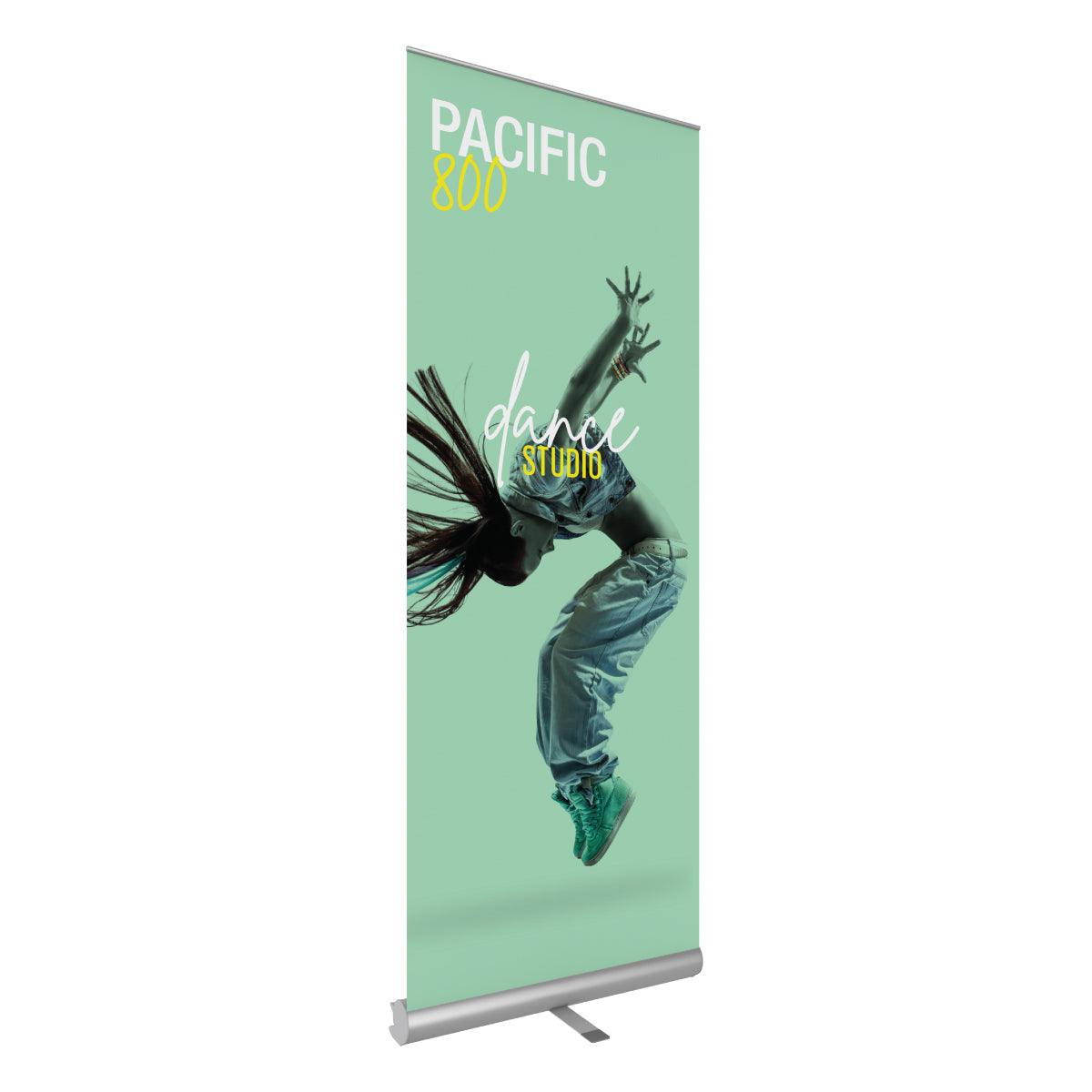 Retractable banner stand featuring dynamic dance studio advertisement for trade shows and exhibitions