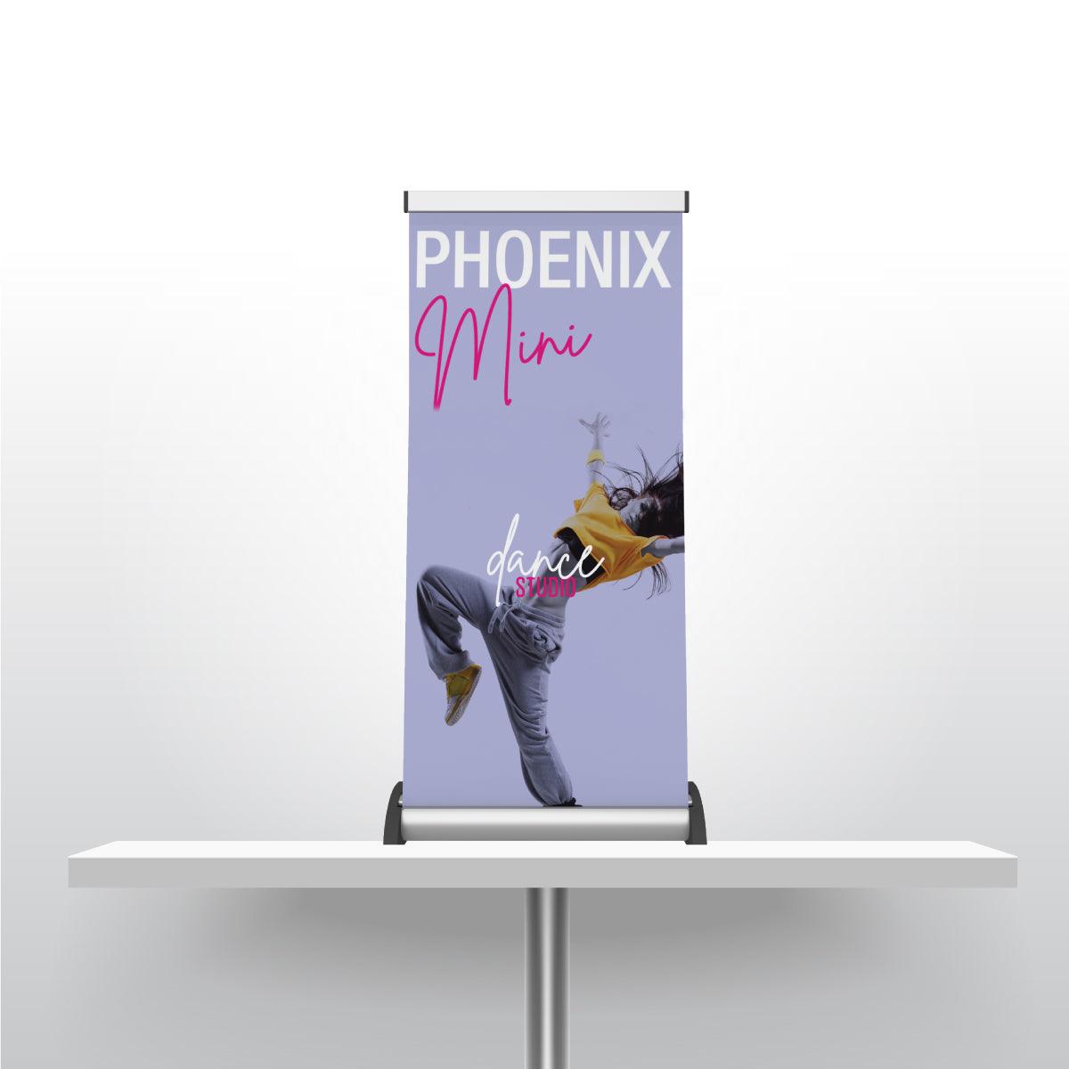 Compact mini banner stand on table showcasing dance studio promotion for trade shows and events