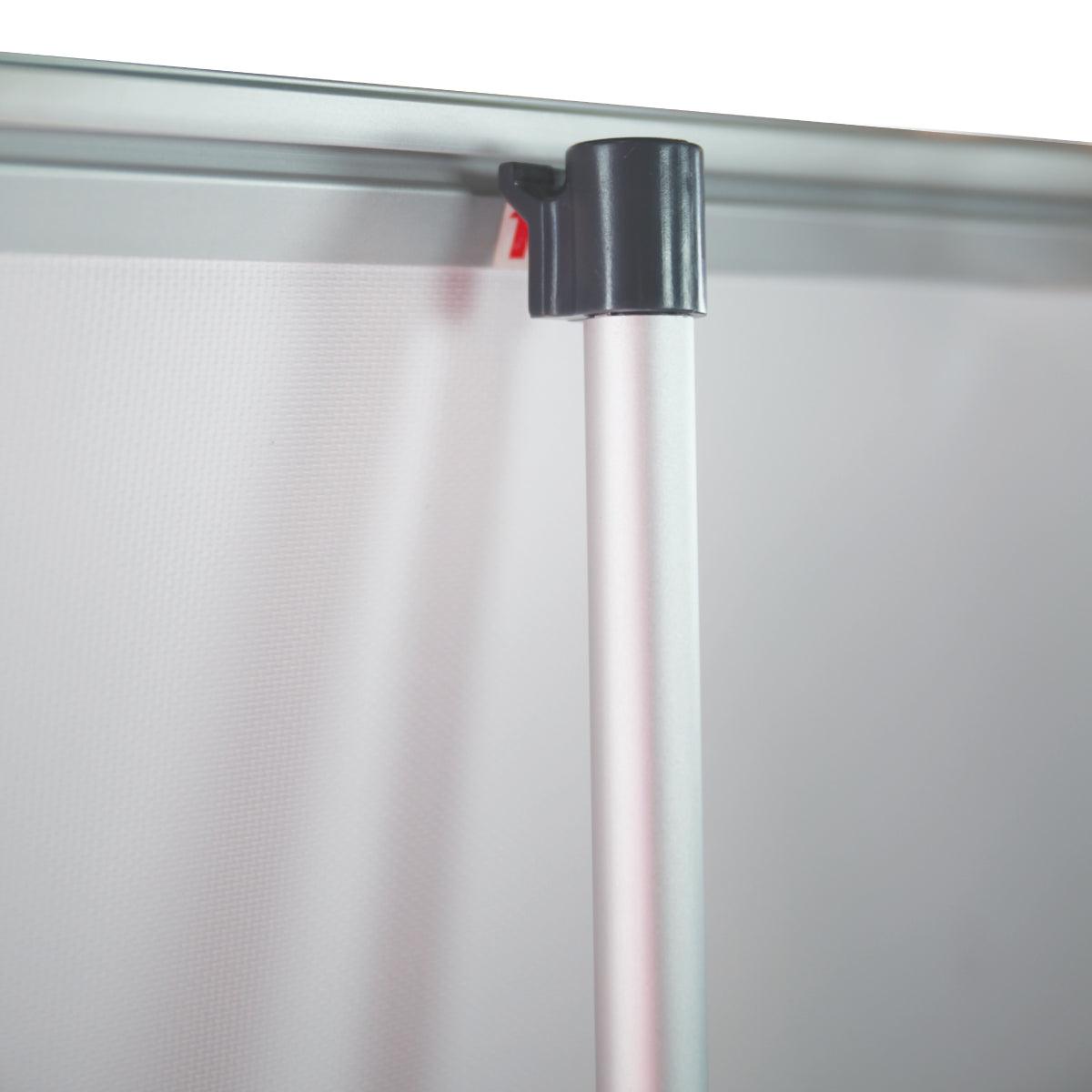 Close-up of trade show banner stand pole and top mounting bracket securing display fabric