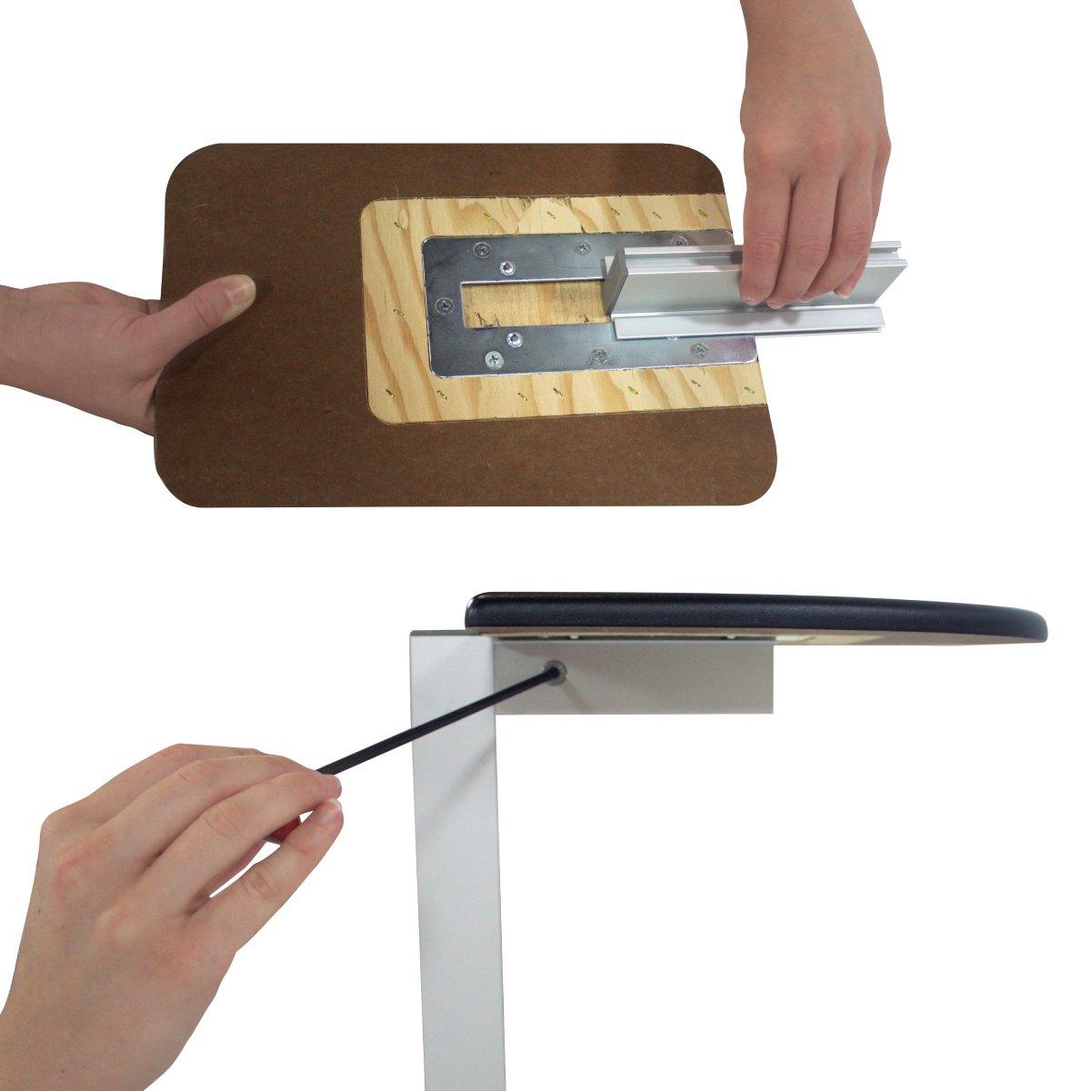 Hands assembling a banner stand accessory kit for trade show and exhibition display setup