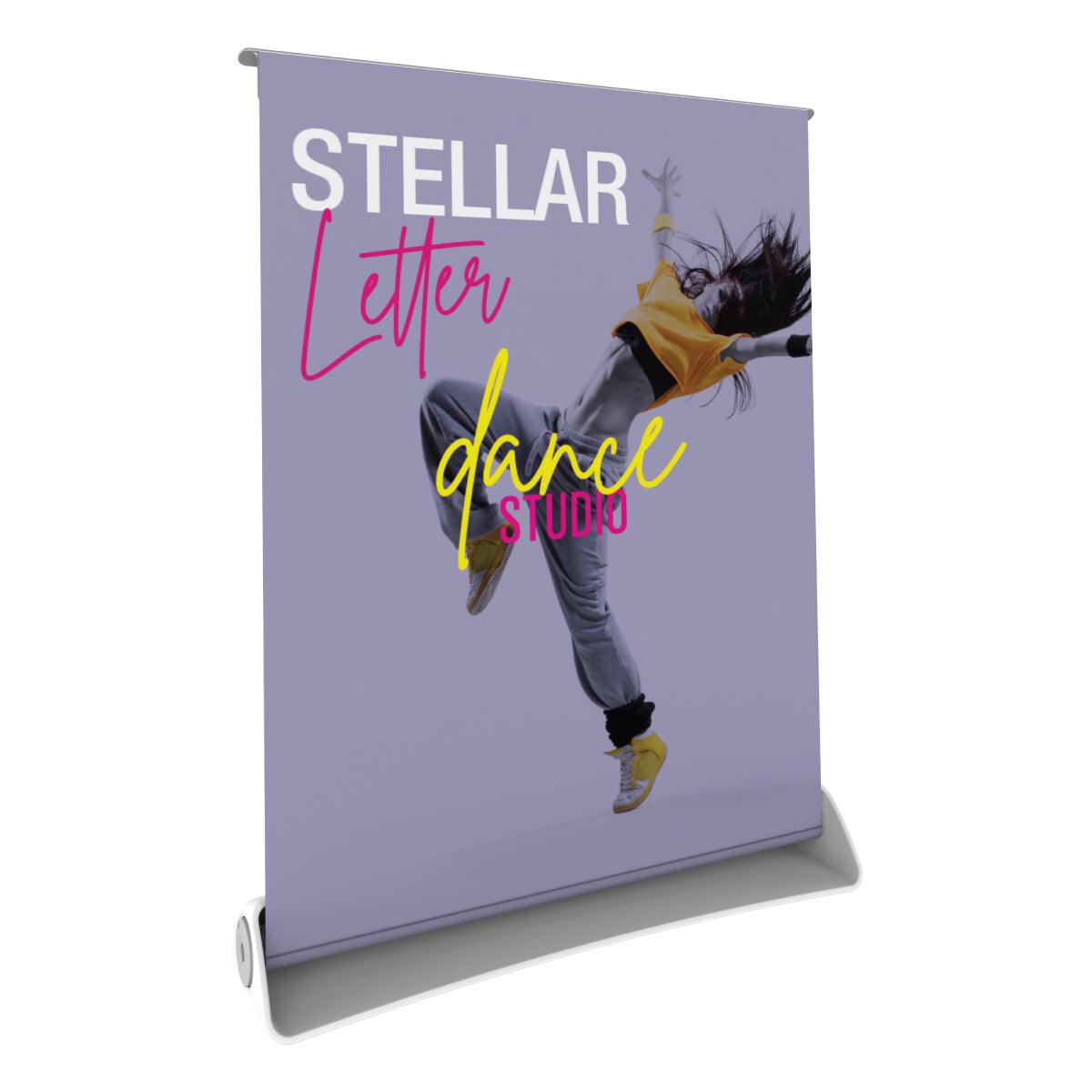 Retractable tabletop banner stand showcasing dynamic dance studio advertisement for trade shows and exhibitions