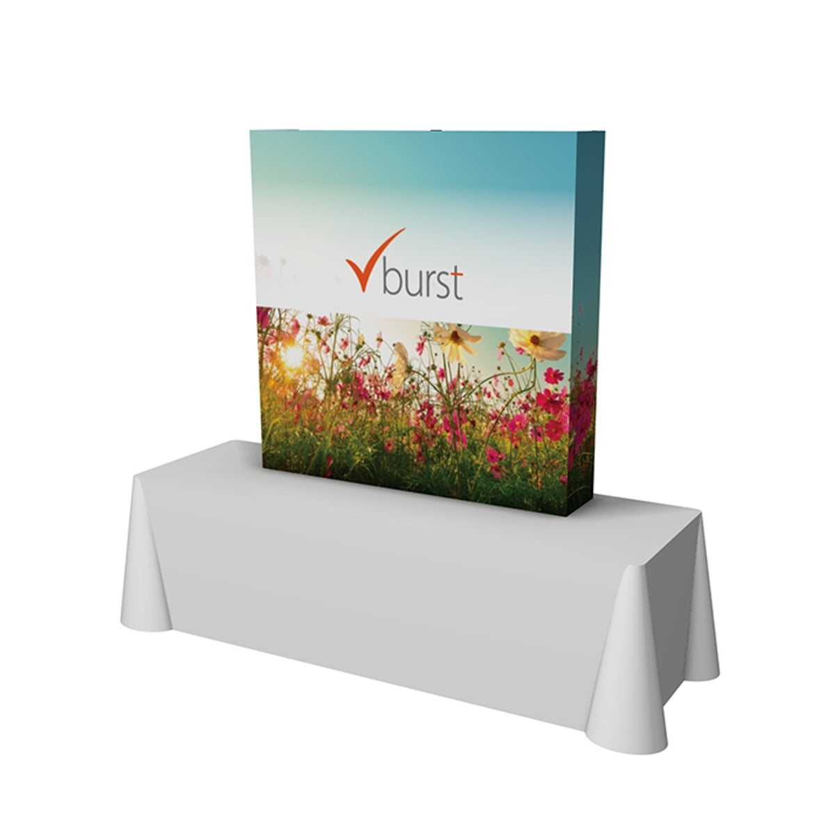 Portable trade show display with floral graphic and logo on tabletop at exhibition events