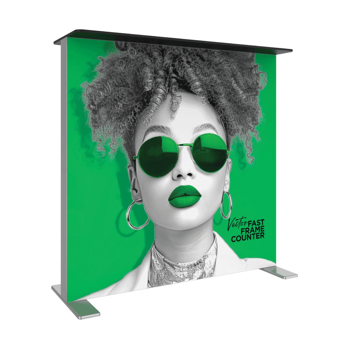 Trade show display counter with large graphic frame featuring stylish woman portrait for exhibitions
