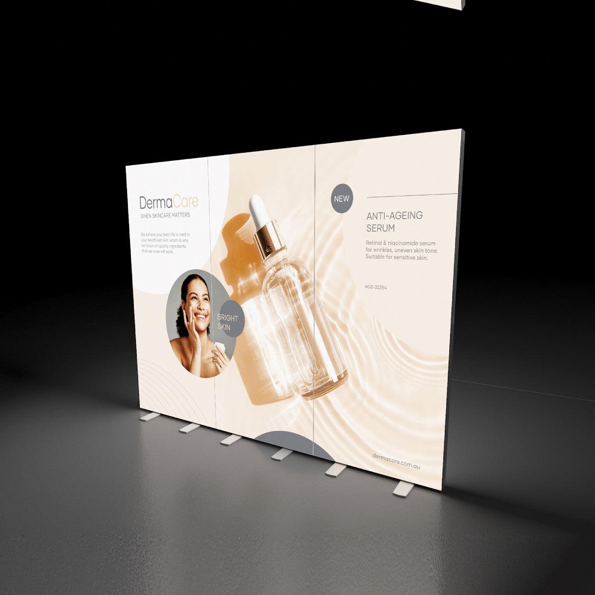 Large trade show display panel featuring anti-ageing serum promotion with product image and smiling woman