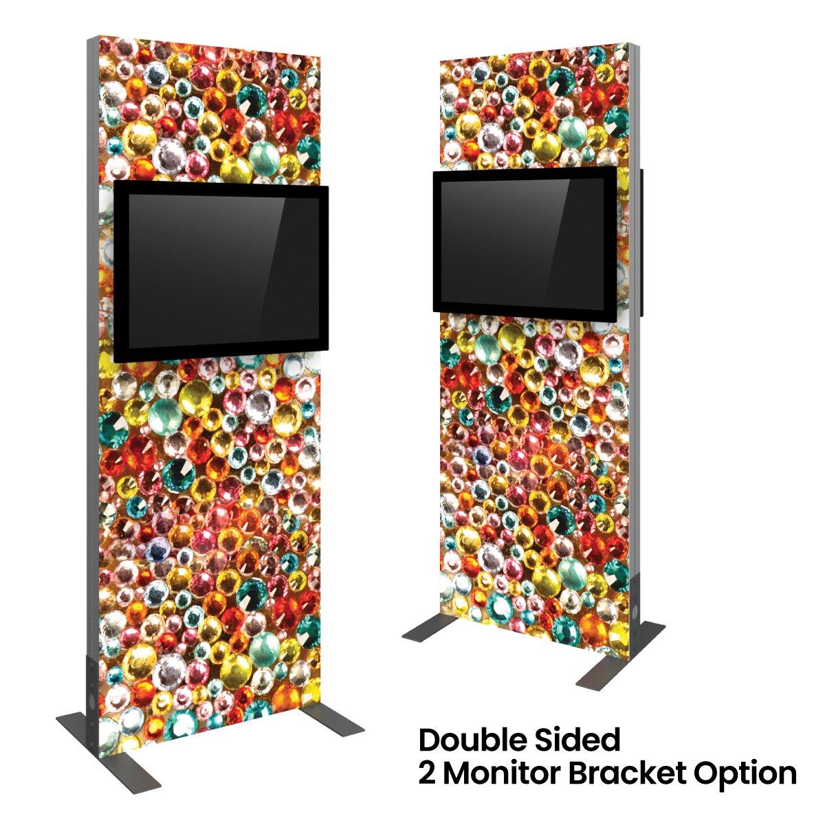 Double-sided trade show kiosk with two monitors mounted on colorful gem-patterned panels for exhibitions and events