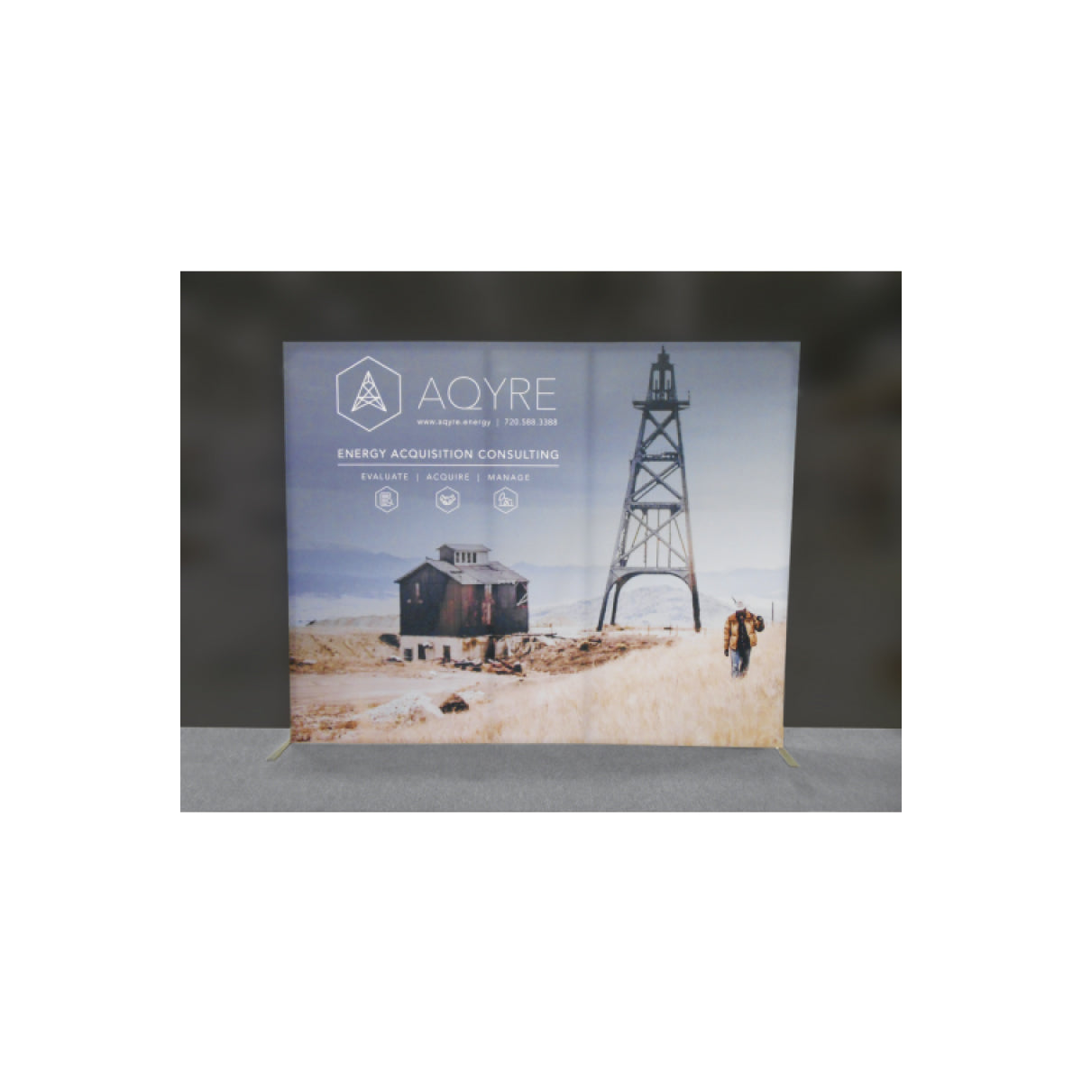 Trade show backwall display featuring energy acquisition consulting with industrial landscape graphics