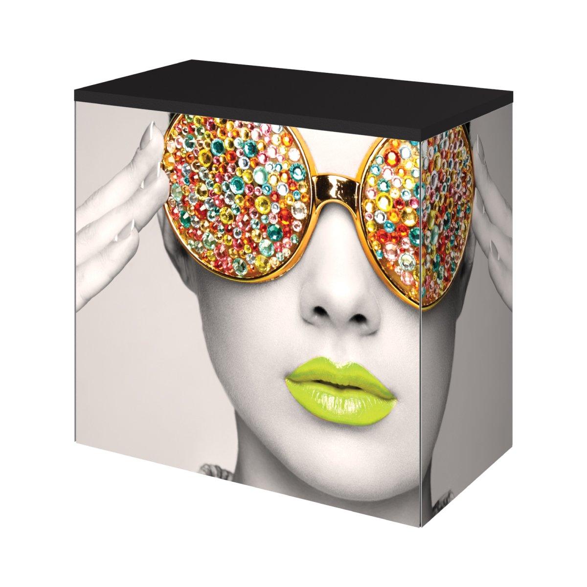 Trade show counter with printed photo of a woman wearing jeweled sunglasses and vibrant lips for exhibitions