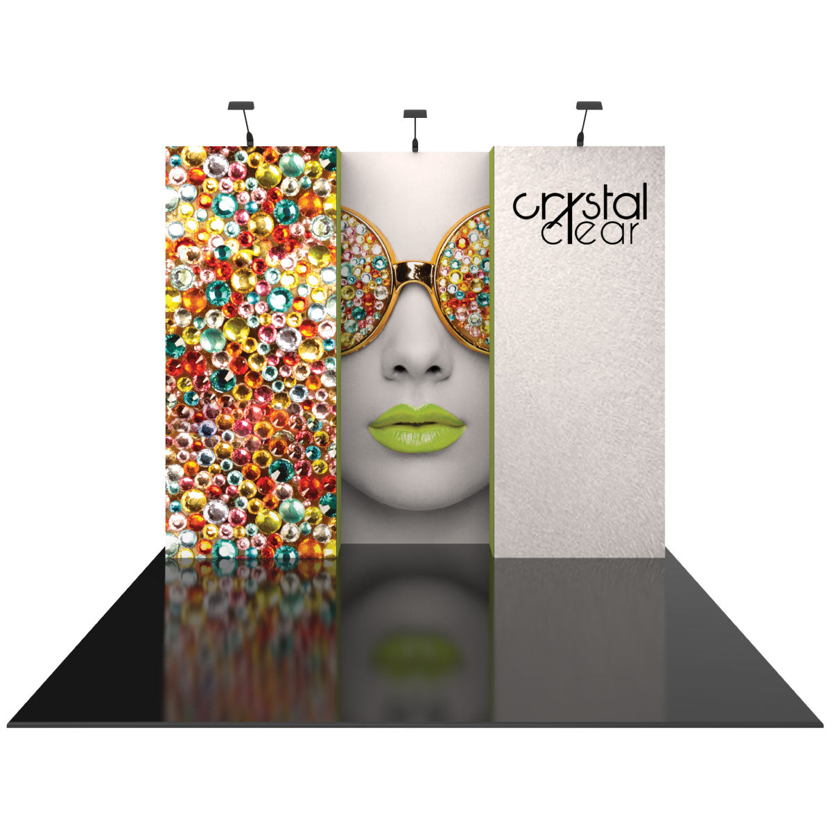 Three-panel trade show display with decorative crystals and stylized face graphic, branded Crystal Clear