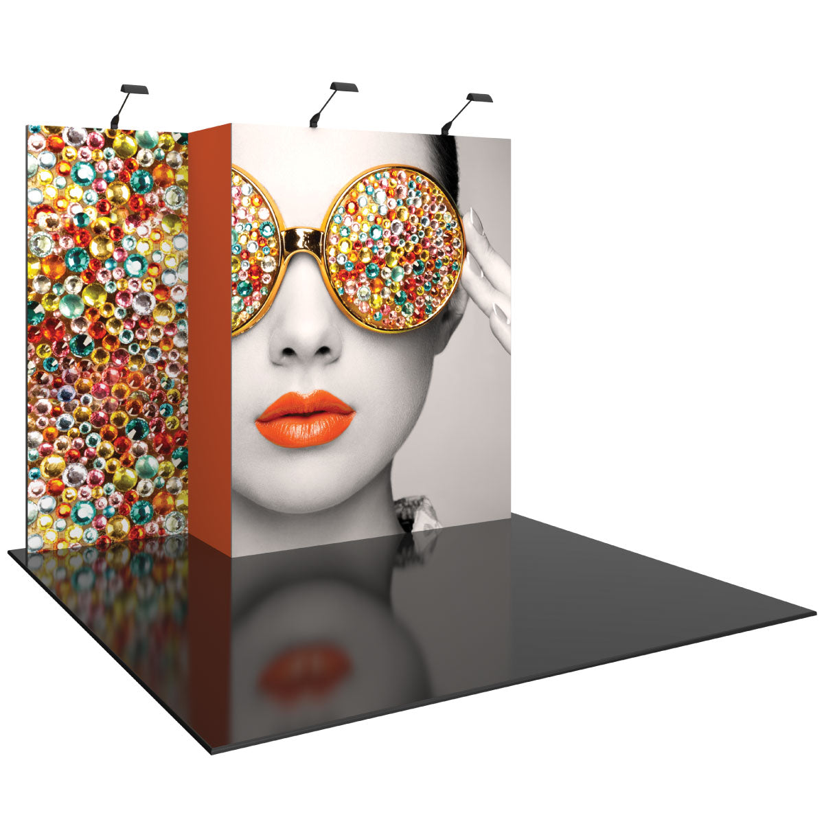 trade show display featuring a large portrait with decorative sunglasses and colorful gem patterns for exhibitions and events