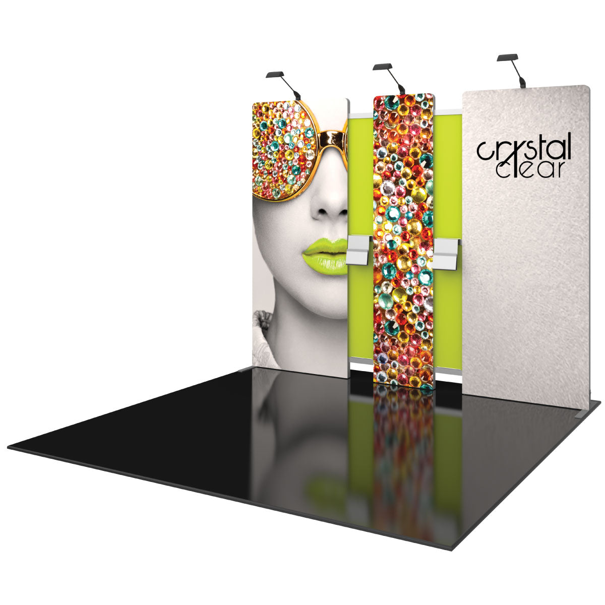 Trade show display with modular backdrop panels featuring fashion and jewel graphics for exhibitions