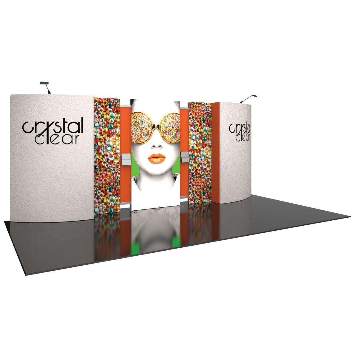 Trade show display booth with graphic panels featuring woman wearing jewel-encrusted sunglasses and crystal designs