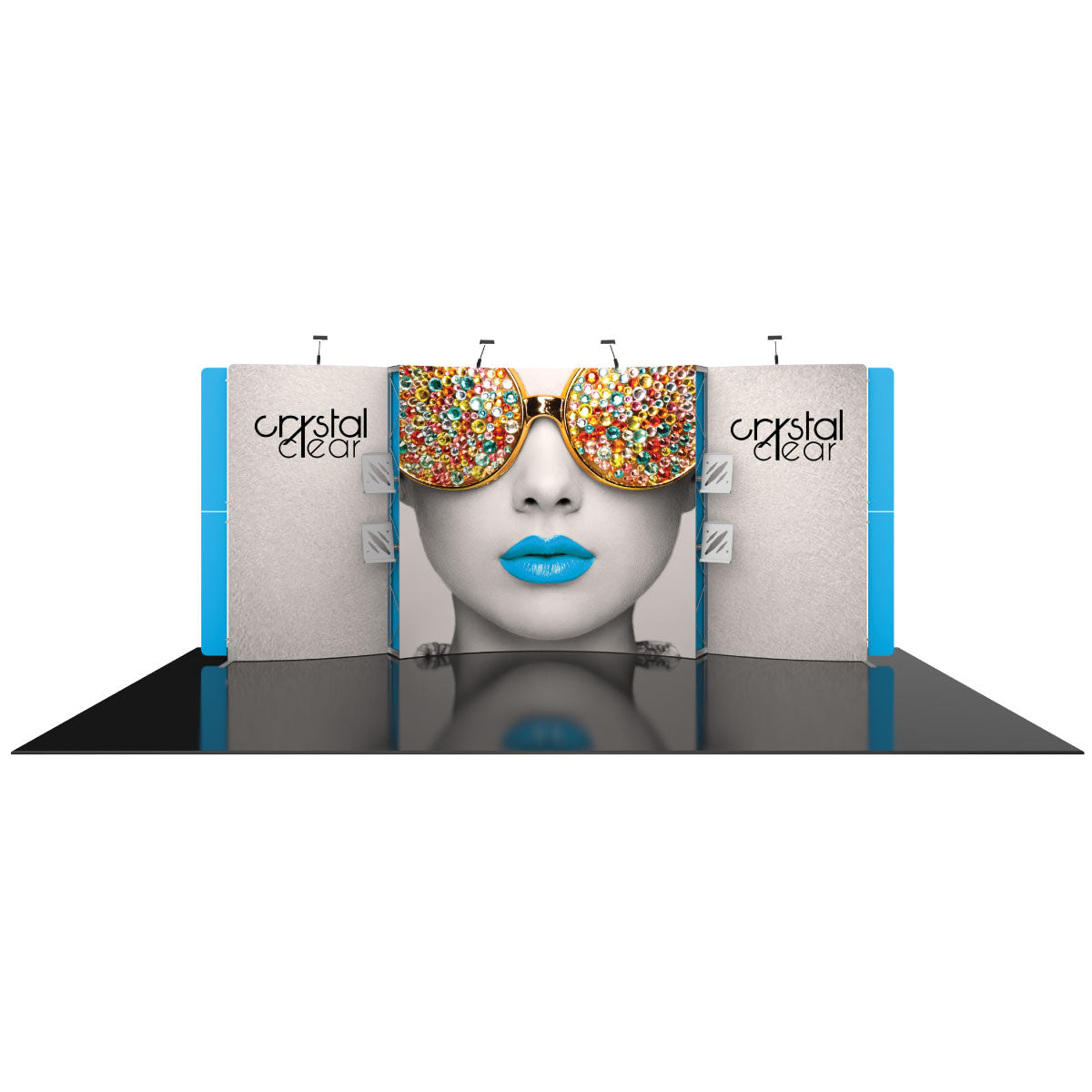 Trade show display featuring a large graphic wall with decorative sunglasses and lip art, brand signage on side panels