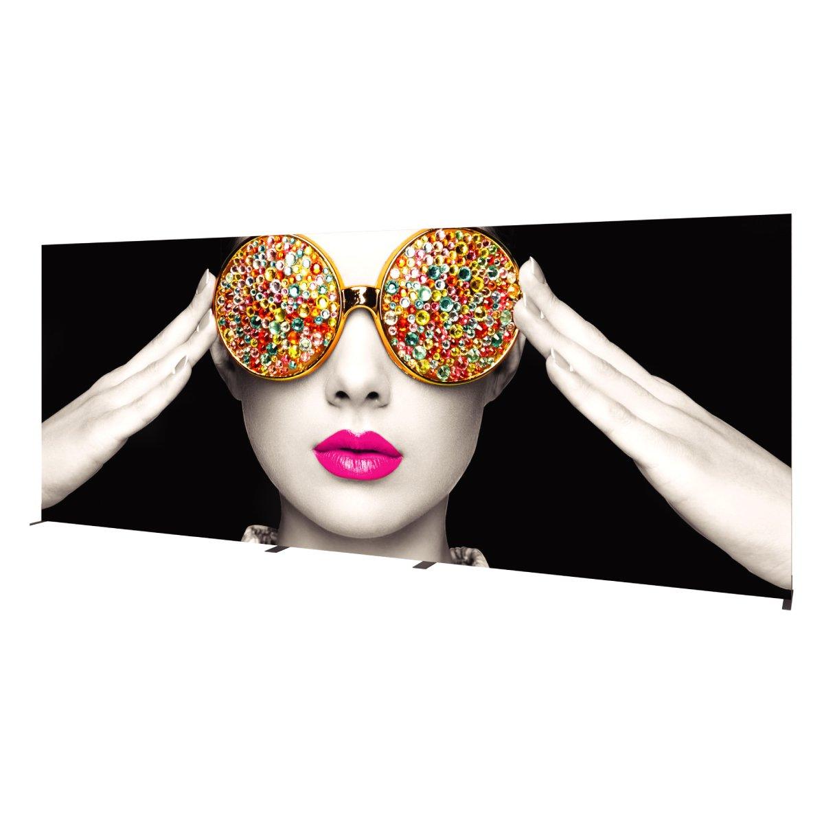 Wide trade show lightbox featuring a close-up woman with gemstone sunglasses and bright lipstick