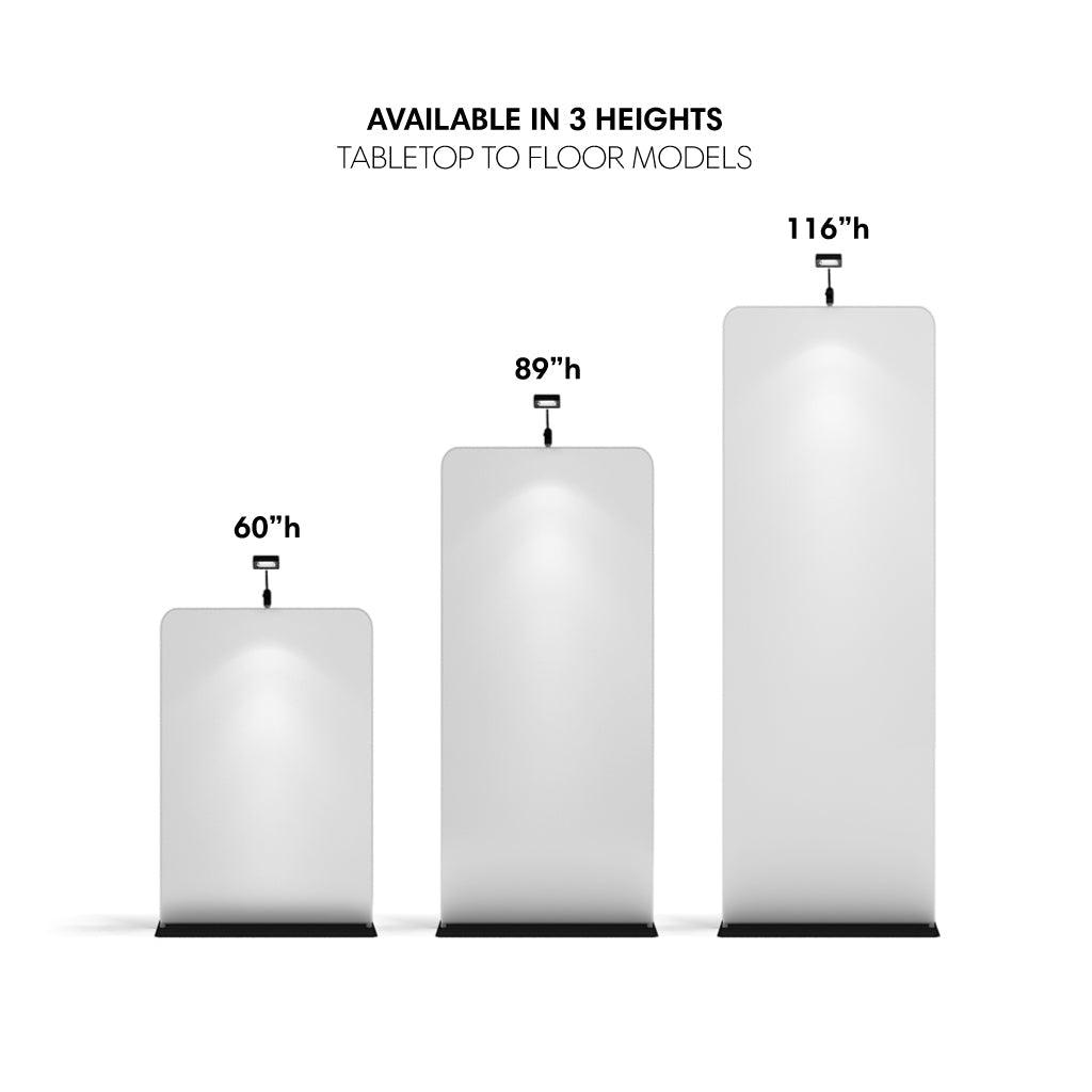 Three trade show banner stands in varying heights from tabletop to floor models with attached spotlight