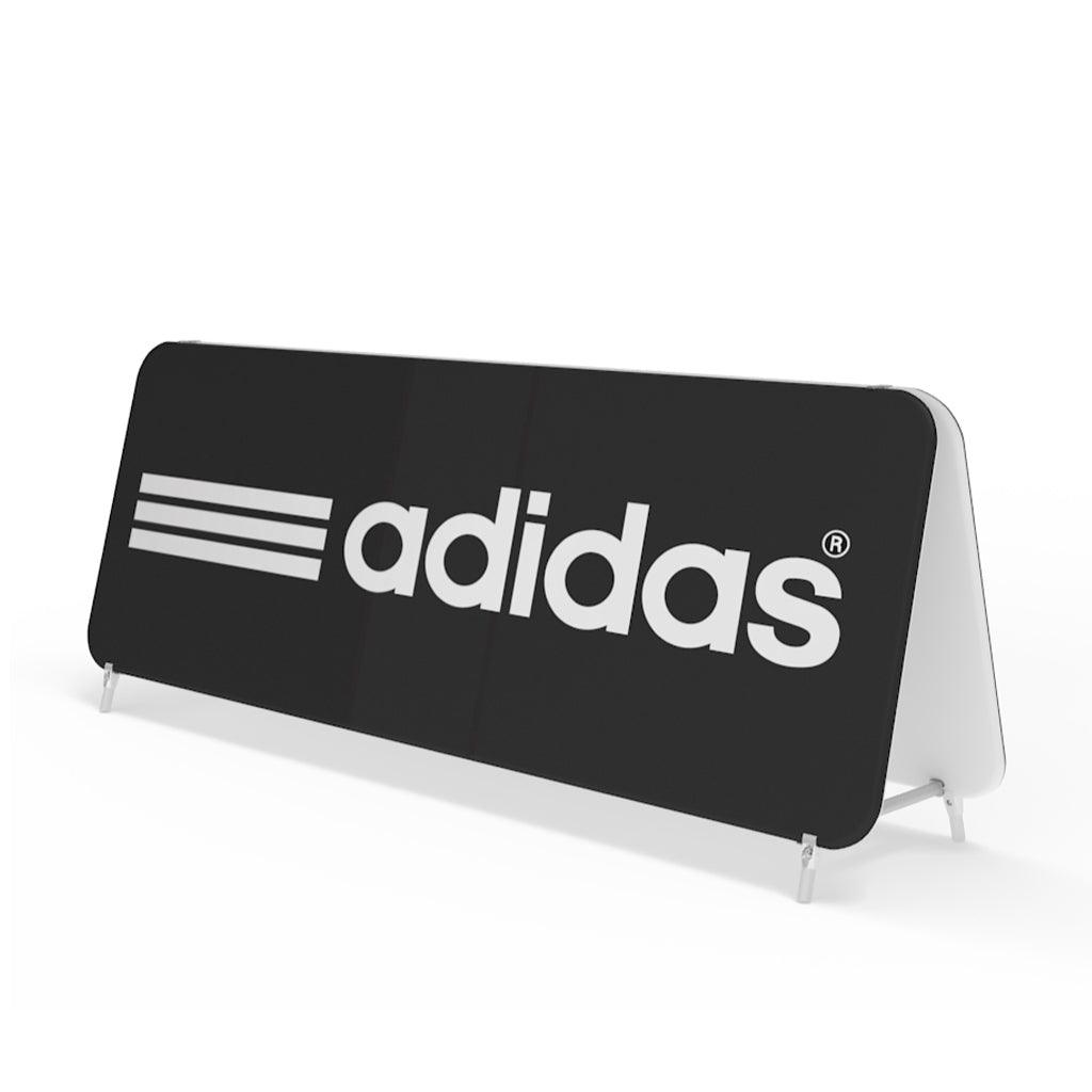 Large double-sided trade show fabric display featuring Adidas logo for exhibitions and events