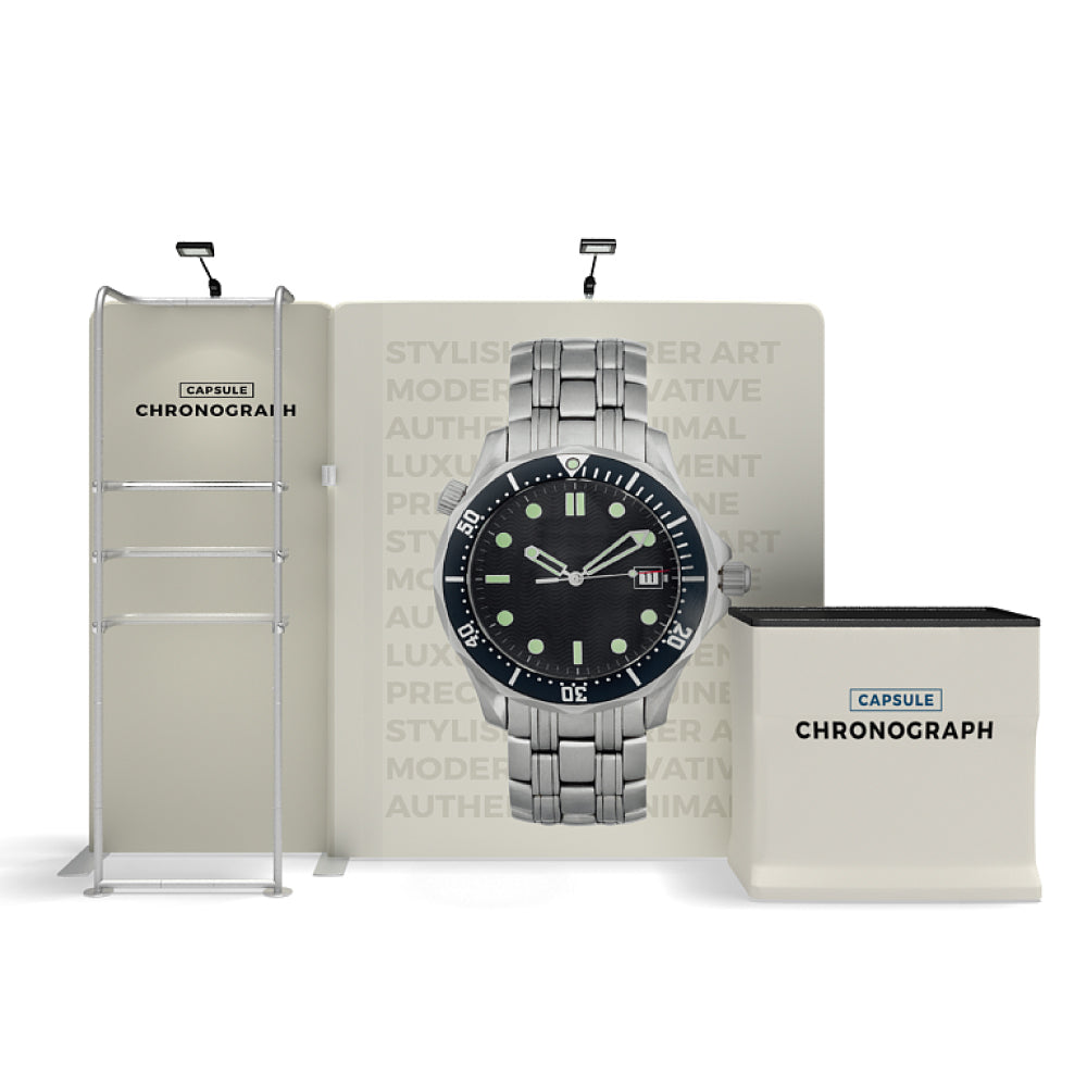 Trade show display featuring a watch advertisement with backdrop, shelving, and branded counter