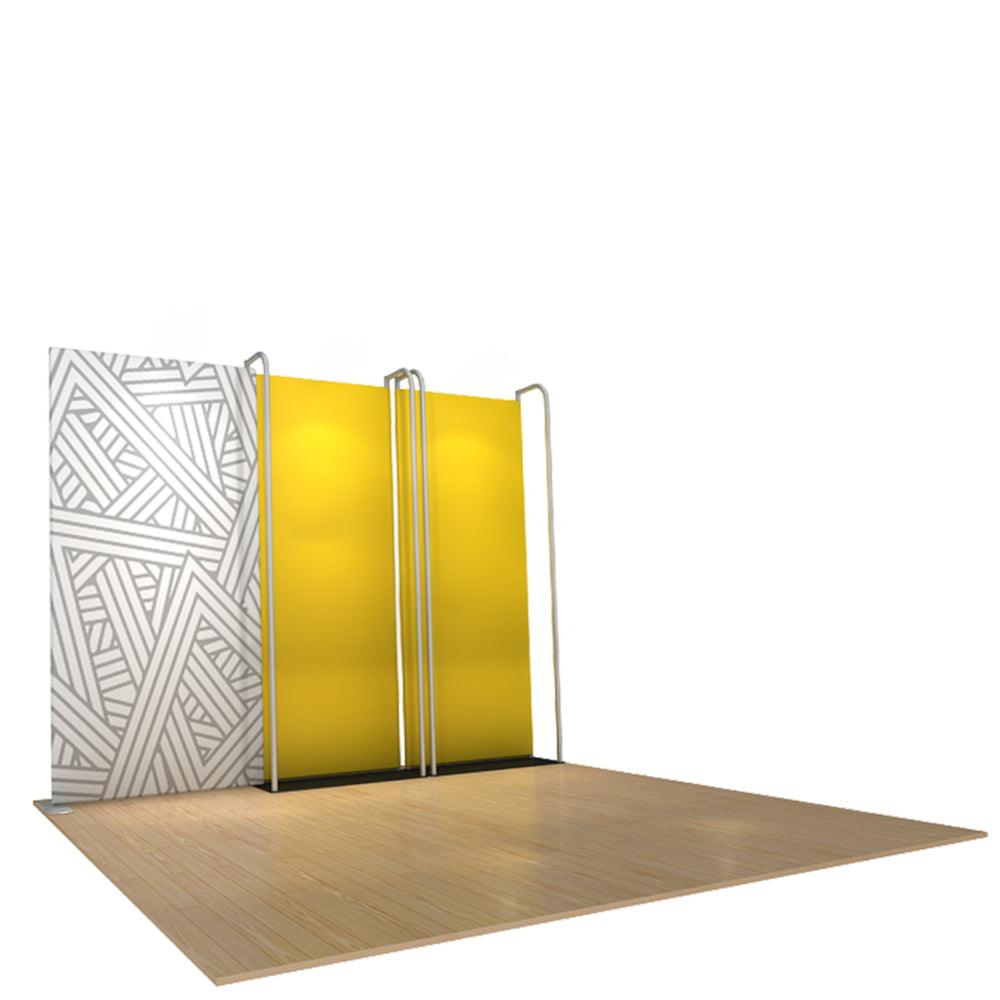 Modular trade show display with graphic panels and freestanding frame on wooden floor