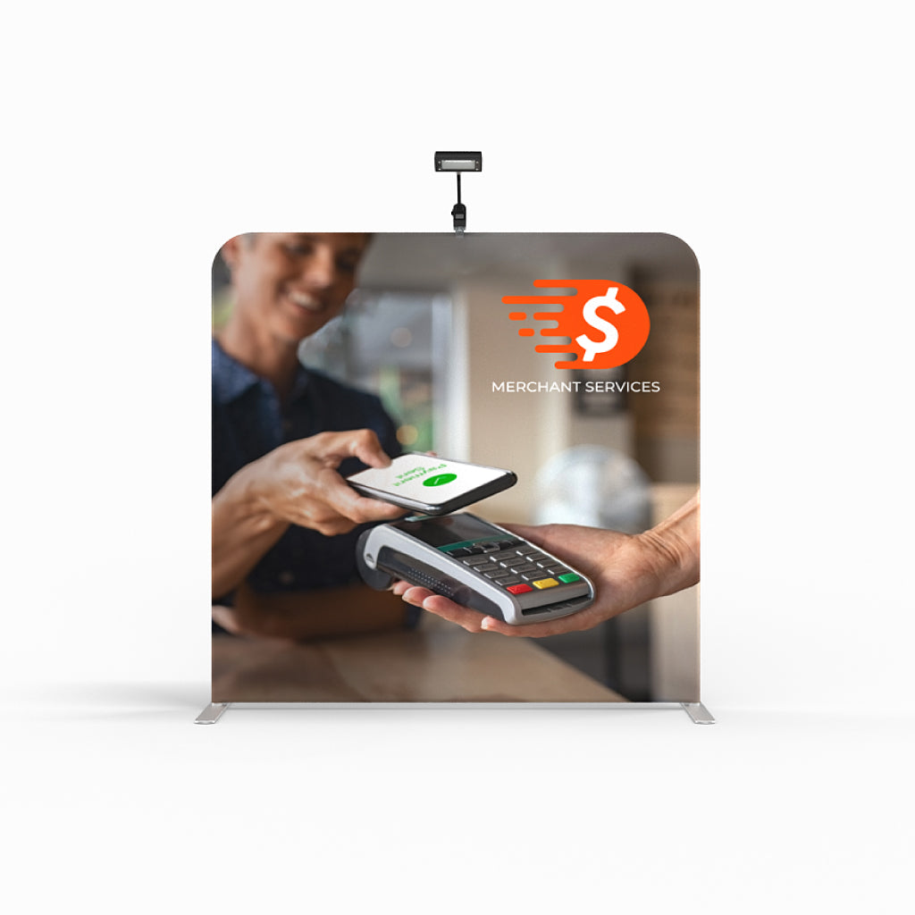Trade show tabletop display featuring contactless payment with phone and card reader for merchant services