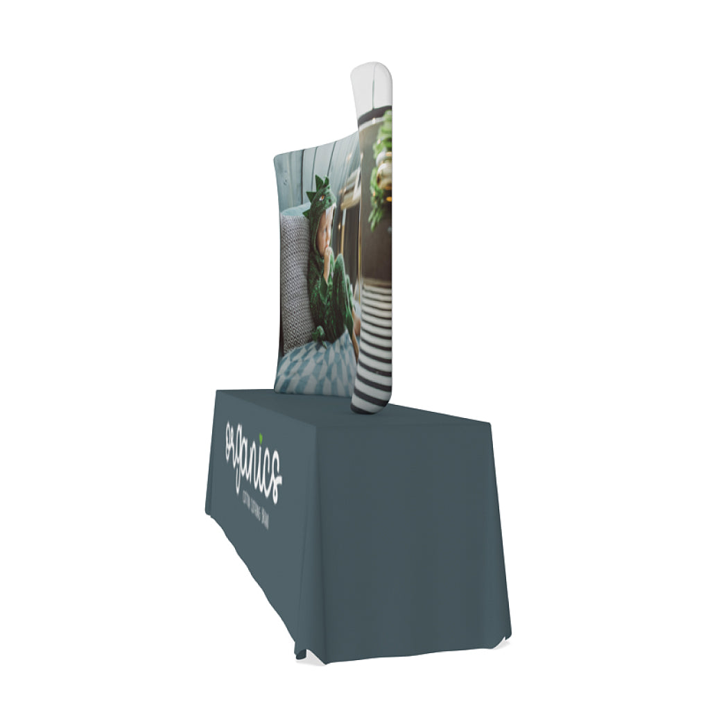 Curved tabletop display with custom fabric graphic and branded table cover for trade shows and events