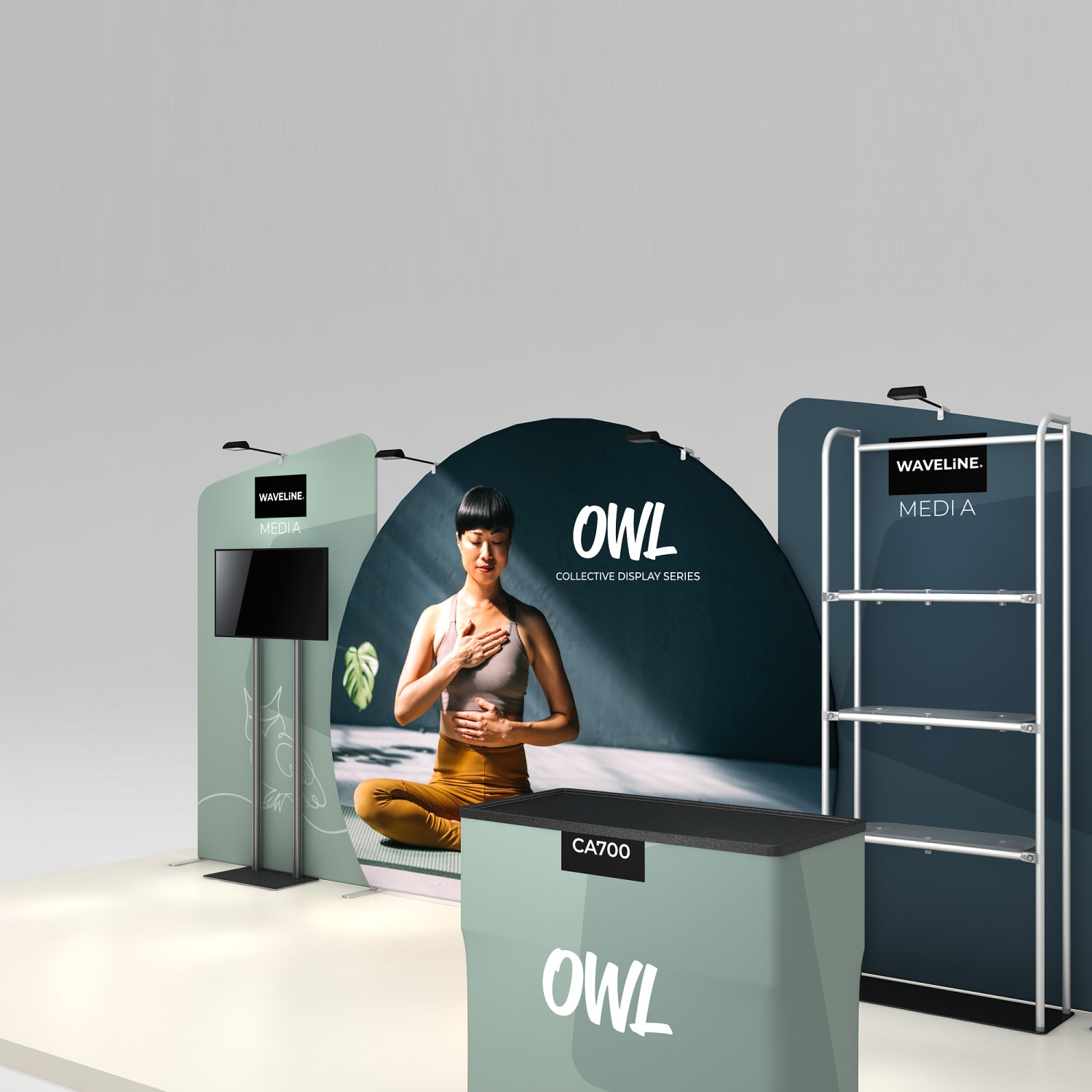 Trade show display with large curved backdrop, media stands, and counter featuring wellness imagery