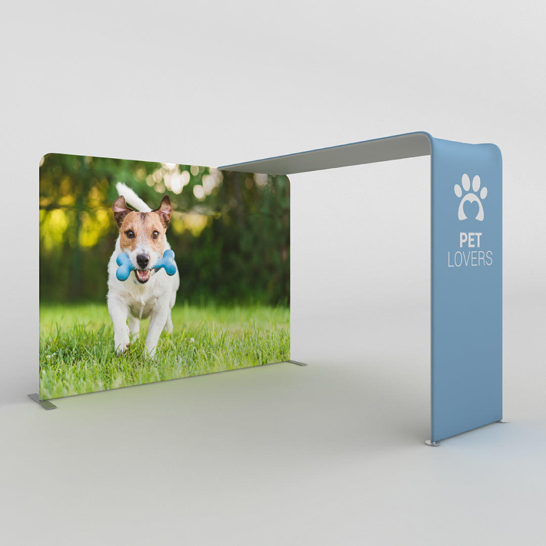 trade show canopy and wave line backdrop with pet lovers branding featuring a dog running with toy