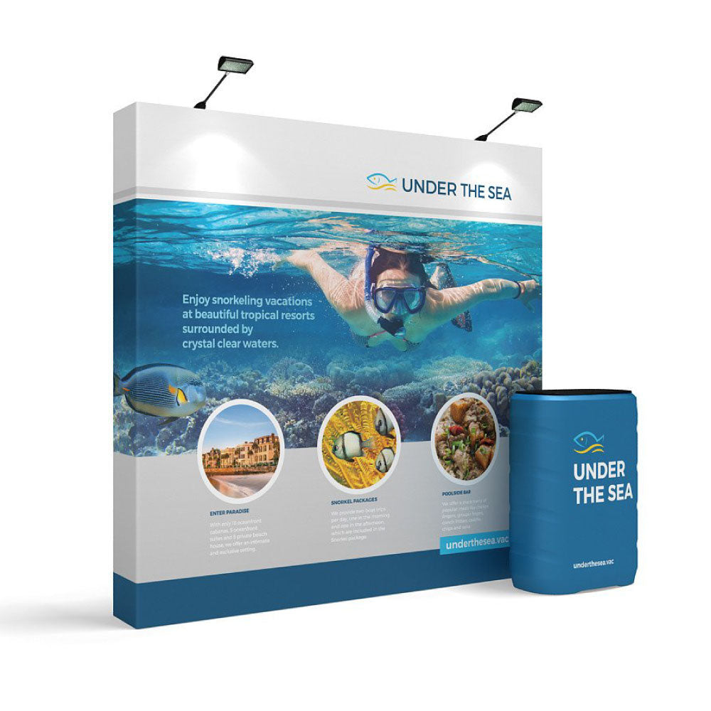 Trade show pop-up display with underwater snorkeling theme and branded counter for exhibitions