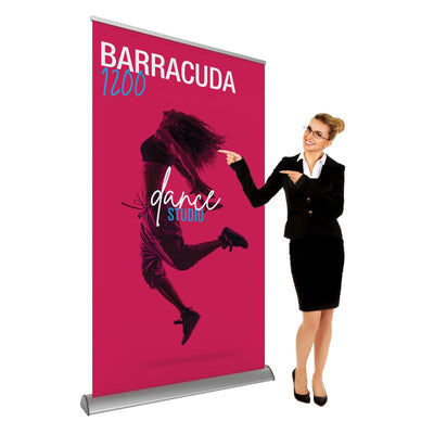 Professional woman presenting Barracuda 1200 banner stand for trade shows and exhibitions