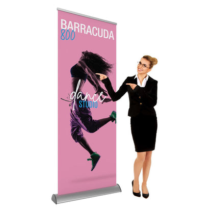 Retractable banner stand showcasing dance studio ad, ideal for trade shows, exhibitions, and events